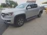 2018 Silver Metallic /Gray Chevrolet Colorado Z71 Crew Cab 2WD Short Box (1GCGSDEN8J1) with an 3.6L V6 DOHC 24V GAS engine, Automatic transmission, located at 3120 W Tennessee St, Tallahassee, FL, 32304-1002, (850) 575-6702, 30.458841, -84.349648 - Used Car Supermarket is proud to present you with this loaded immaculate 2018 Chevy Colorado Crew Cab Z71 with low miles. Used Car Supermarket prides itself in offering you the finest pre-owned vehicle in Tallahassee. Used Car Supermarket has been locally family owned and operated for over a half ce - Photo#1