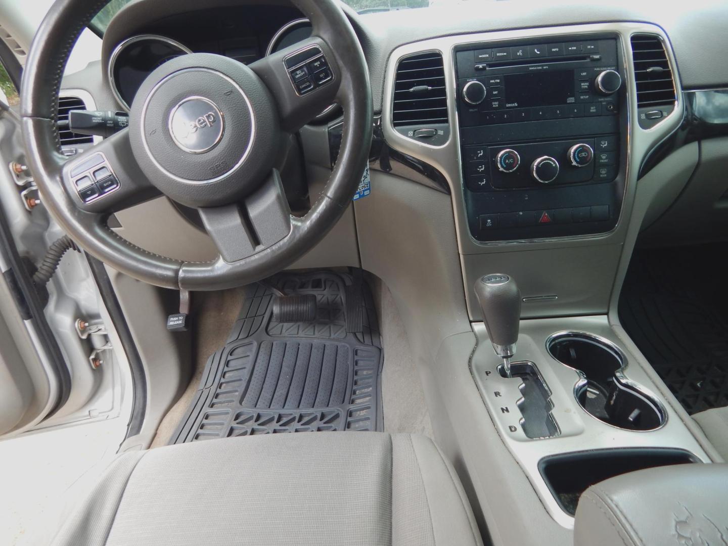 2011 Silver Metallic /Gray Jeep Grand Cherokee Laredo 4WD (1J4RR4GG4BC) with an 3.6L V6 DOHC 24V engine, 5-Speed Automatic transmission, located at 3120 W Tennessee St, Tallahassee, FL, 32304-1002, (850) 575-6702, 30.458841, -84.349648 - Used Car Supermarket is proud to present you with this loaded immaculate 2011 Jeep Grand Cherokee Laredo 4x4 with low miles. Used Car Supermarket prides itself in offering you the finest pre-owned vehicle in Tallahassee. Used Car Supermarket has been locally family owned and operated for over a half - Photo#4