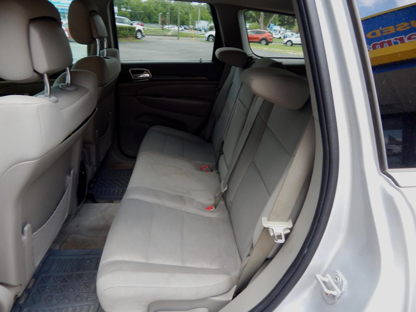 2011 Silver Metallic /Gray Jeep Grand Cherokee Laredo 4WD (1J4RR4GG4BC) with an 3.6L V6 DOHC 24V engine, 5-Speed Automatic transmission, located at 3120 W Tennessee St, Tallahassee, FL, 32304-1002, (850) 575-6702, 30.458841, -84.349648 - Used Car Supermarket is proud to present you with this loaded immaculate 2011 Jeep Grand Cherokee Laredo 4x4 with low miles. Used Car Supermarket prides itself in offering you the finest pre-owned vehicle in Tallahassee. Used Car Supermarket has been locally family owned and operated for over a half - Photo#6