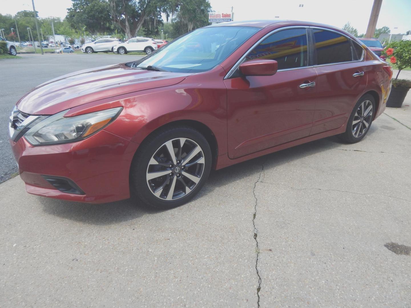 2016 Maroon /Charcoal Nissan Altima 2.5 SR (1N4AL3AP6GN) with an 2.5L L4 DOHC 16V engine, CVT transmission, located at 3120 W Tennessee St, Tallahassee, FL, 32304-1002, (850) 575-6702, 30.458841, -84.349648 - Photo#1