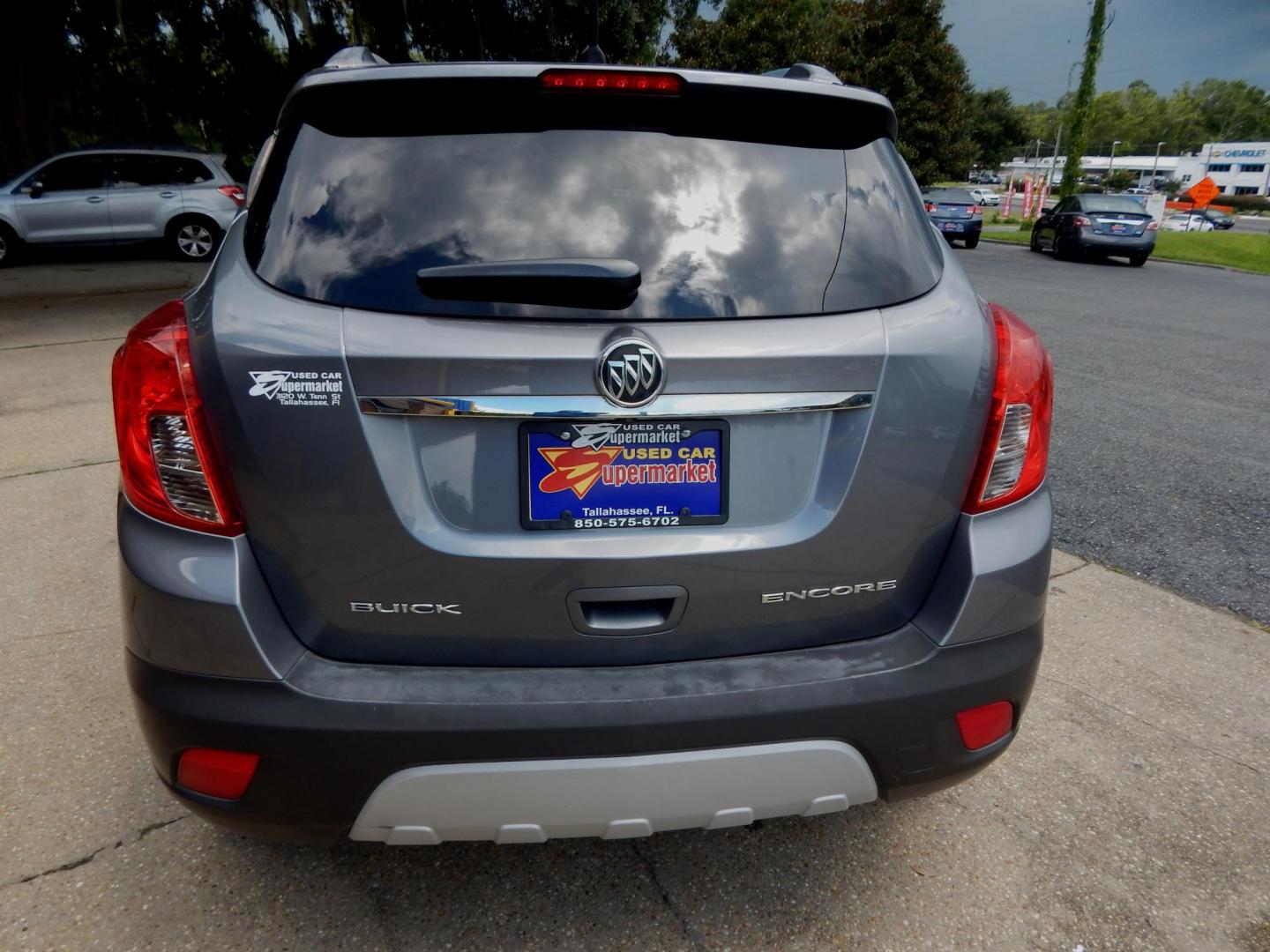2013 Gray /Charcoal Leather/cloth Buick Encore Convenience FWD (KL4CJBSB6DB) with an 1.4L L4 DOHC 16V TURBO engine, Automatic transmission, located at 3120 W Tennessee St, Tallahassee, FL, 32304-1002, (850) 575-6702, 30.458841, -84.349648 - Used Car Supermarket is proud to present you with this loaded immaculate 2013 Buick Encore Convenience with leather/cloth and low miles . Used Car Supermarket prides itself in offering you the finest pre-owned vehicle in Tallahassee. Used Car Supermarket has been locally family owned and operated fo - Photo#3