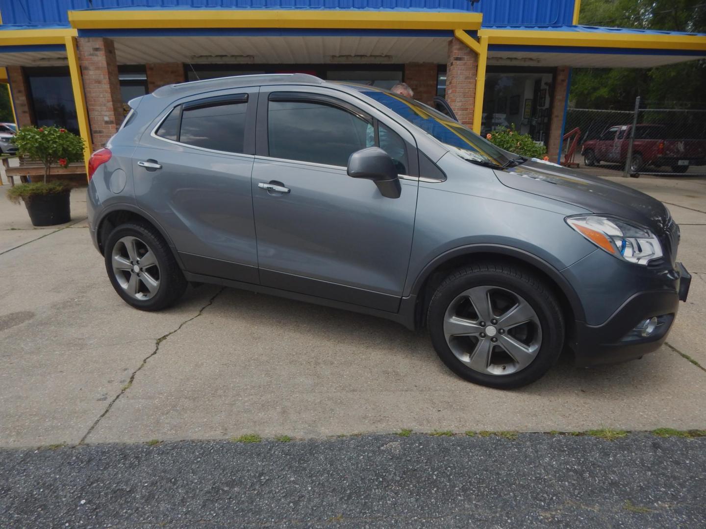 2013 Gray /Charcoal Leather/cloth Buick Encore Convenience FWD (KL4CJBSB6DB) with an 1.4L L4 DOHC 16V TURBO engine, Automatic transmission, located at 3120 W Tennessee St, Tallahassee, FL, 32304-1002, (850) 575-6702, 30.458841, -84.349648 - Used Car Supermarket is proud to present you with this loaded immaculate 2013 Buick Encore Convenience with leather/cloth and low miles . Used Car Supermarket prides itself in offering you the finest pre-owned vehicle in Tallahassee. Used Car Supermarket has been locally family owned and operated fo - Photo#0