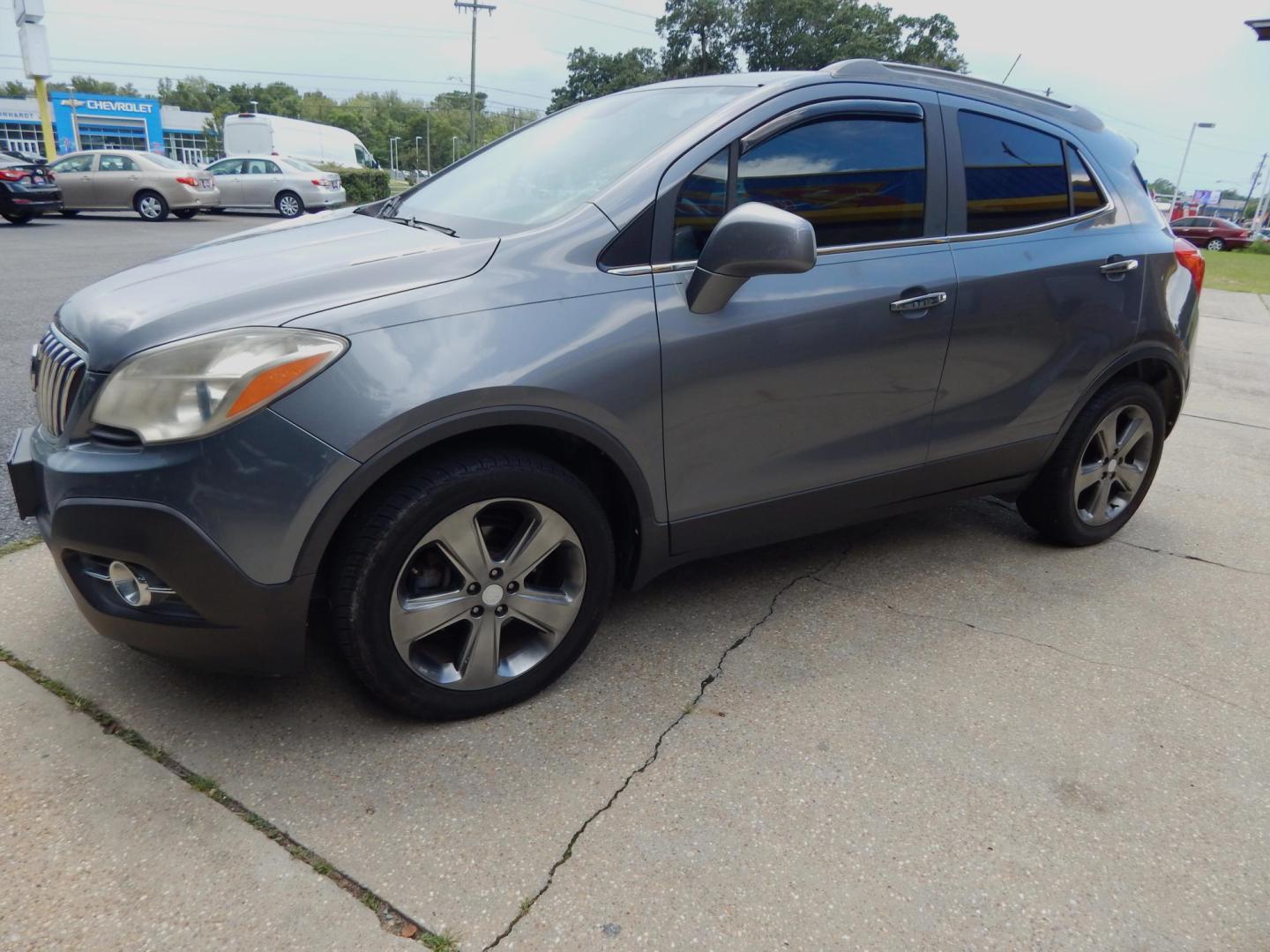 2013 Gray /Charcoal Leather/cloth Buick Encore Convenience FWD (KL4CJBSB6DB) with an 1.4L L4 DOHC 16V TURBO engine, Automatic transmission, located at 3120 W Tennessee St, Tallahassee, FL, 32304-1002, (850) 575-6702, 30.458841, -84.349648 - Used Car Supermarket is proud to present you with this loaded immaculate 2013 Buick Encore Convenience with leather/cloth and low miles . Used Car Supermarket prides itself in offering you the finest pre-owned vehicle in Tallahassee. Used Car Supermarket has been locally family owned and operated fo - Photo#1