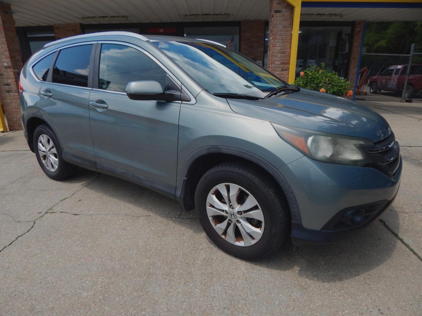 2012 Sage /Charcoal Leather Honda CR-V EX-L 2WD AT (5J6RM3H72CL) with an 2.4L L4 DOHC 16V engine, Automatic transmission, located at 3120 W Tennessee St, Tallahassee, FL, 32304-1002, (850) 575-6702, 30.458841, -84.349648 - Used Car Supermarket is proud to present you with this loaded immaculate 2012 Honda CRV EXL with leather, sunroof and low miles. Used Car Supermarket prides itself in offering you the finest pre-owned vehicle in Tallahassee. Used Car Supermarket has been locally family owned and operated for over 49 - Photo#0