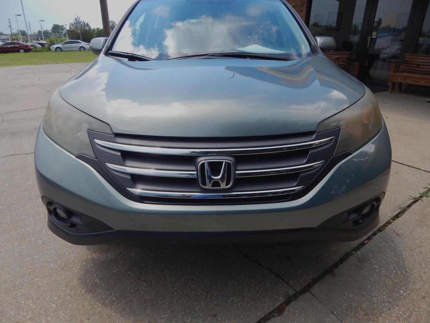 2012 Sage /Charcoal Leather Honda CR-V EX-L 2WD AT (5J6RM3H72CL) with an 2.4L L4 DOHC 16V engine, Automatic transmission, located at 3120 W Tennessee St, Tallahassee, FL, 32304-1002, (850) 575-6702, 30.458841, -84.349648 - Used Car Supermarket is proud to present you with this loaded immaculate 2012 Honda CRV EXL with leather, sunroof and low miles. Used Car Supermarket prides itself in offering you the finest pre-owned vehicle in Tallahassee. Used Car Supermarket has been locally family owned and operated for over 49 - Photo#2