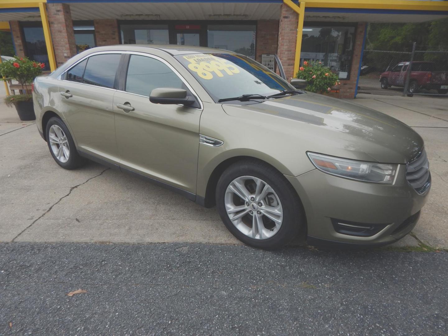 2013 Sage /Charcoal Ford Taurus SEL FWD (1FAHP2E84DG) with an 3.5L V6 DOHC 24V engine, 6-Speed Automatic transmission, located at 3120 W Tennessee St, Tallahassee, FL, 32304-1002, (850) 575-6702, 30.458841, -84.349648 - Used Car Supermarket is proud to present you with this loaded immaculate 2013 Ford Taurus SEL with low miles. Used Car Supermarket prides itself in offering you the finest pre-owned vehicle in Tallahassee. Used Car Supermarket has been locally family owned and operated for over 49 years. Our Taurus - Photo#0