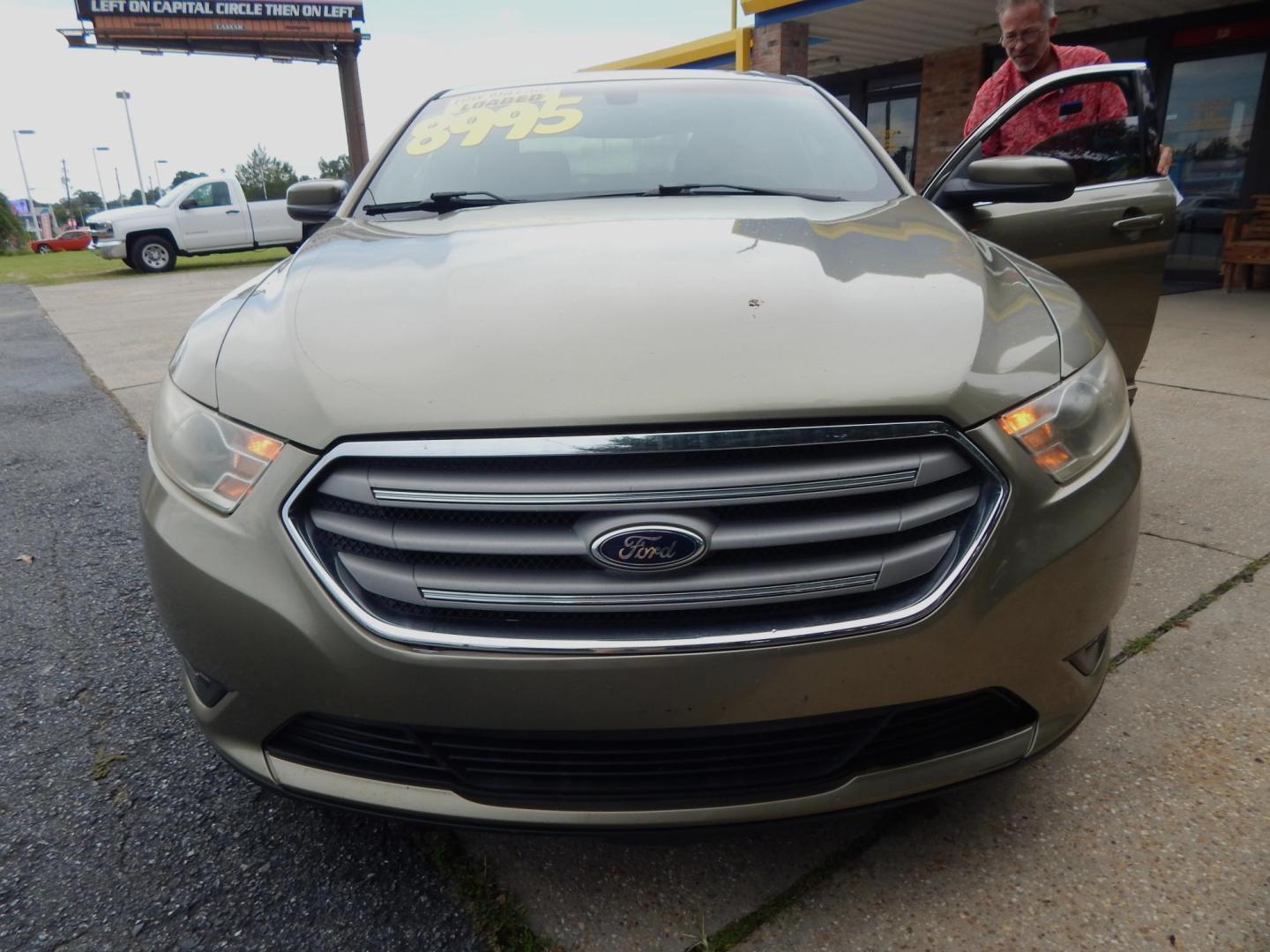 2013 Sage /Charcoal Ford Taurus SEL FWD (1FAHP2E84DG) with an 3.5L V6 DOHC 24V engine, 6-Speed Automatic transmission, located at 3120 W Tennessee St, Tallahassee, FL, 32304-1002, (850) 575-6702, 30.458841, -84.349648 - Used Car Supermarket is proud to present you with this loaded immaculate 2013 Ford Taurus SEL with low miles. Used Car Supermarket prides itself in offering you the finest pre-owned vehicle in Tallahassee. Used Car Supermarket has been locally family owned and operated for over 49 years. Our Taurus - Photo#2
