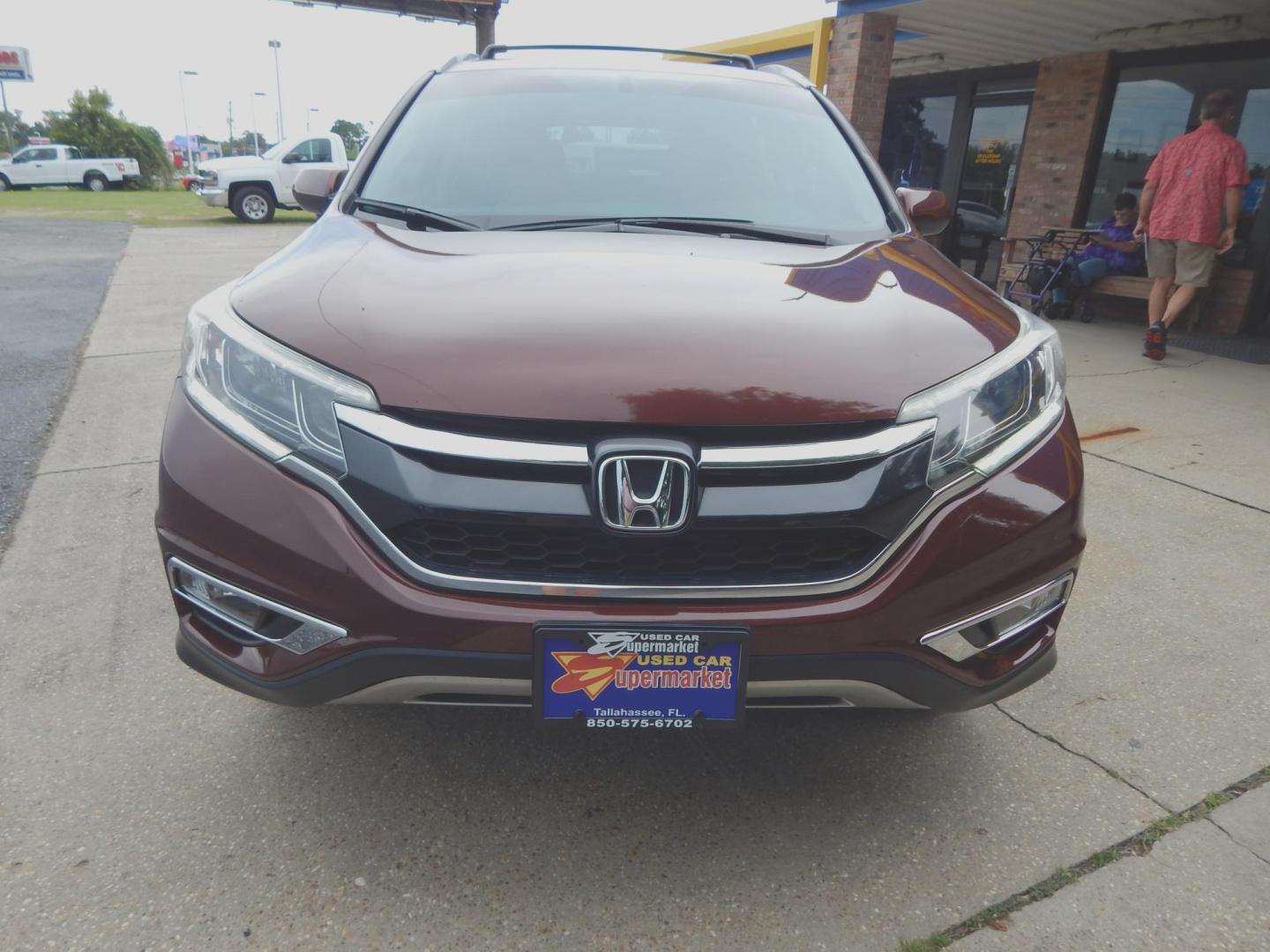 2016 Maroon /Charcoal Leather Honda CR-V EX-L 2WD (2HKRM3H77GH) with an 2.4L L4 DOHC 16V engine, Automatic transmission, located at 3120 W Tennessee St, Tallahassee, FL, 32304-1002, (850) 575-6702, 30.458841, -84.349648 - Used Car Supermarket is proud to present you with this loaded immaculate 2016 Honda CRV EX-L with sunroof, leather and low miles. Used Car Supermarket prides itself in offering you the finest pre-owned vehicle in Tallahassee. Used Car Supermarket has been locally family owned and operated for over 5 - Photo#2