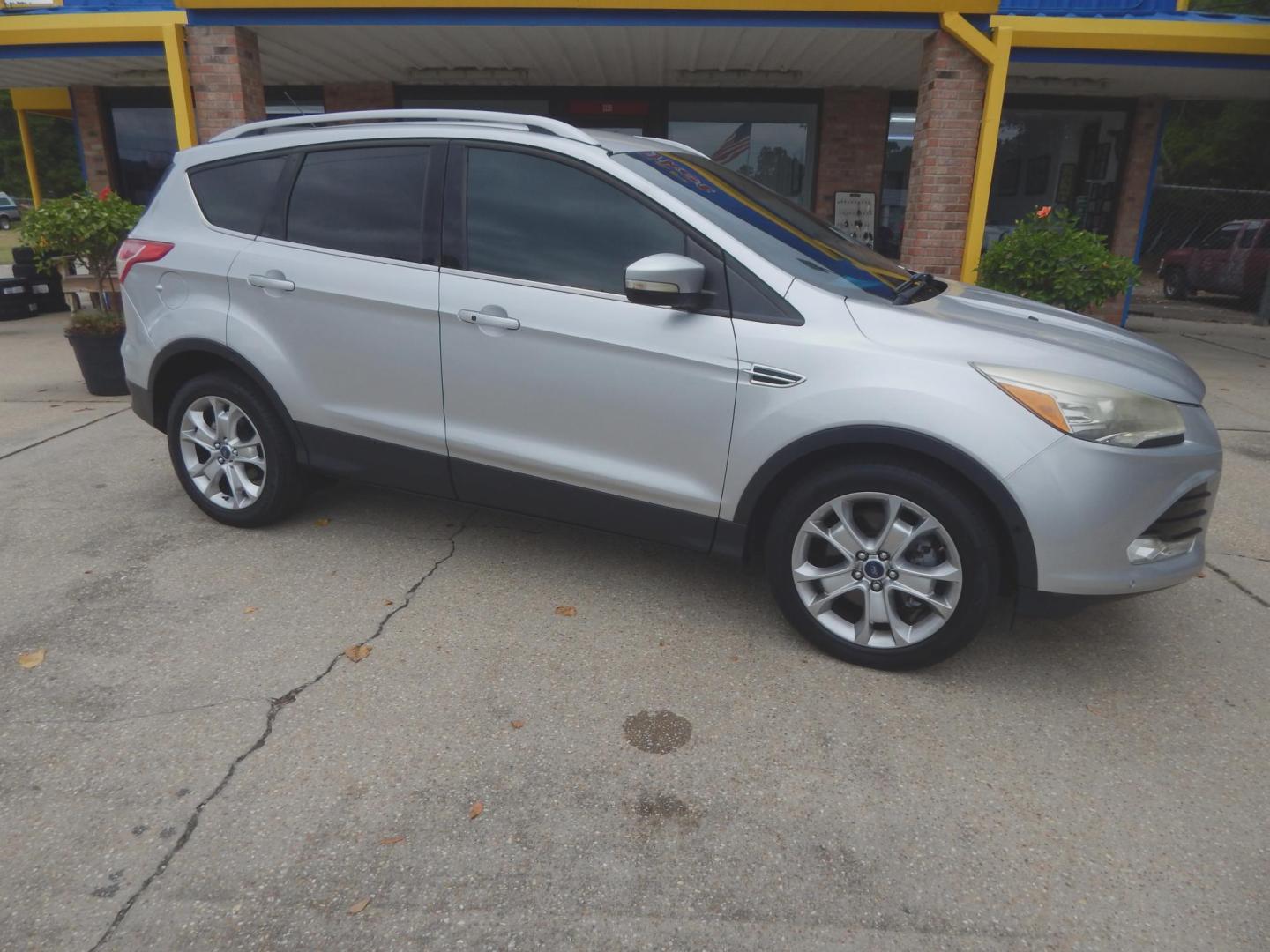 2015 Silver Metallic /Gray Ford Escape Titanium 4WD (1FMCU9J90FU) with an 2.0L L4 DOHC 16V engine, 6-Speed Automatic transmission, located at 3120 W Tennessee St, Tallahassee, FL, 32304-1002, (850) 575-6702, 30.458841, -84.349648 - Used Car Supermarket is proud to present you with this loaded immaculate 2015 Ford Escape Titanium with leather. Used Car Supermarket prides itself in offering you the finest pre-owned vehicle in Tallahassee. Used Car Supermarket has been locally family owned and operated for over 50 years. Our Esca - Photo#0