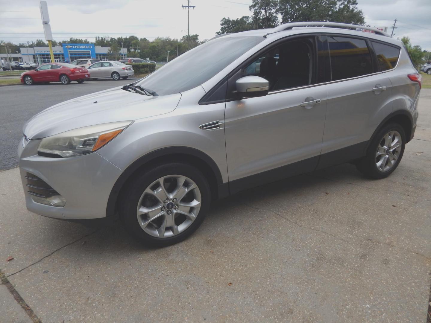 2015 Silver Metallic /Gray Ford Escape Titanium 4WD (1FMCU9J90FU) with an 2.0L L4 DOHC 16V engine, 6-Speed Automatic transmission, located at 3120 W Tennessee St, Tallahassee, FL, 32304-1002, (850) 575-6702, 30.458841, -84.349648 - Used Car Supermarket is proud to present you with this loaded immaculate 2015 Ford Escape Titanium with leather. Used Car Supermarket prides itself in offering you the finest pre-owned vehicle in Tallahassee. Used Car Supermarket has been locally family owned and operated for over 50 years. Our Esca - Photo#1
