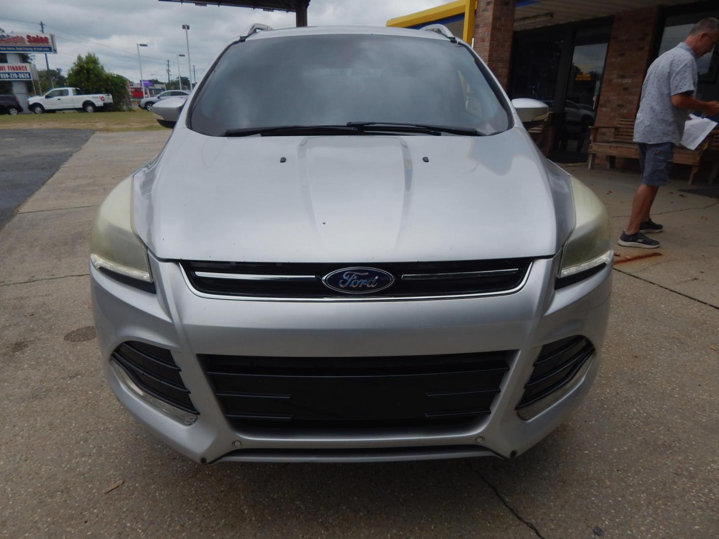 2015 Silver Metallic /Gray Ford Escape Titanium 4WD (1FMCU9J90FU) with an 2.0L L4 DOHC 16V engine, 6-Speed Automatic transmission, located at 3120 W Tennessee St, Tallahassee, FL, 32304-1002, (850) 575-6702, 30.458841, -84.349648 - Used Car Supermarket is proud to present you with this loaded immaculate 2015 Ford Escape Titanium with leather. Used Car Supermarket prides itself in offering you the finest pre-owned vehicle in Tallahassee. Used Car Supermarket has been locally family owned and operated for over 50 years. Our Esca - Photo#2