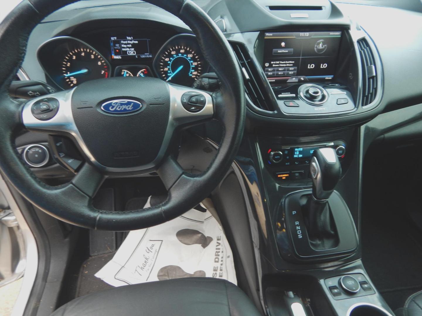 2015 Silver Metallic /Gray Ford Escape Titanium 4WD (1FMCU9J90FU) with an 2.0L L4 DOHC 16V engine, 6-Speed Automatic transmission, located at 3120 W Tennessee St, Tallahassee, FL, 32304-1002, (850) 575-6702, 30.458841, -84.349648 - Used Car Supermarket is proud to present you with this loaded immaculate 2015 Ford Escape Titanium with leather. Used Car Supermarket prides itself in offering you the finest pre-owned vehicle in Tallahassee. Used Car Supermarket has been locally family owned and operated for over 50 years. Our Esca - Photo#3