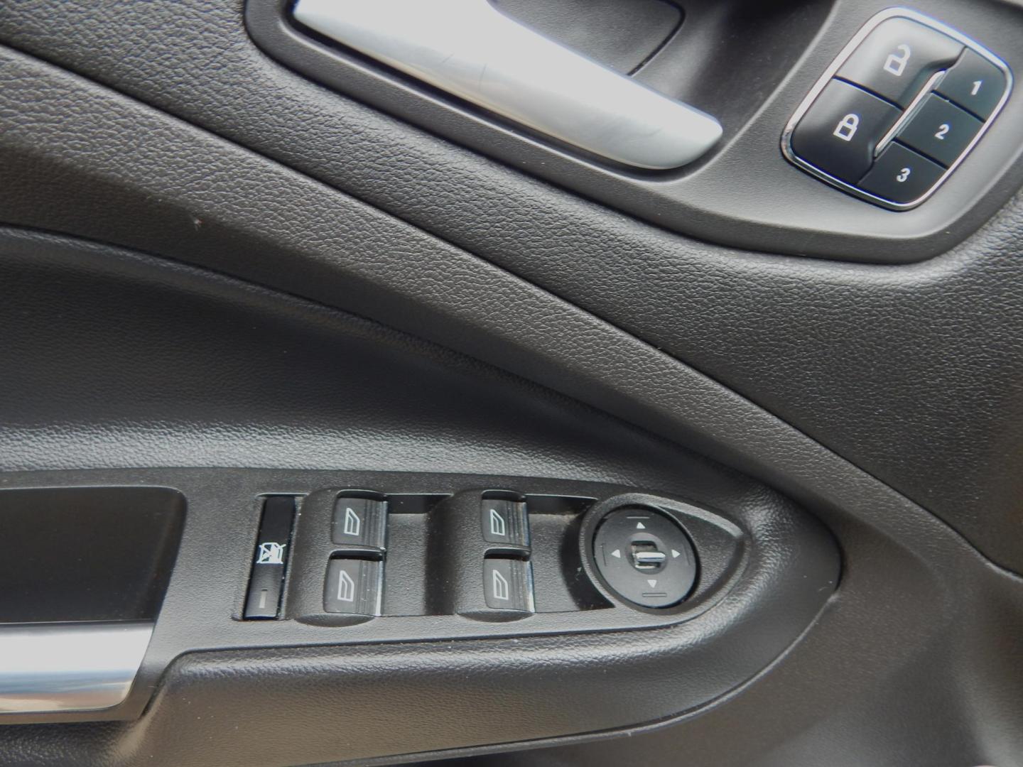 2015 Silver Metallic /Gray Ford Escape Titanium 4WD (1FMCU9J90FU) with an 2.0L L4 DOHC 16V engine, 6-Speed Automatic transmission, located at 3120 W Tennessee St, Tallahassee, FL, 32304-1002, (850) 575-6702, 30.458841, -84.349648 - Used Car Supermarket is proud to present you with this loaded immaculate 2015 Ford Escape Titanium with leather. Used Car Supermarket prides itself in offering you the finest pre-owned vehicle in Tallahassee. Used Car Supermarket has been locally family owned and operated for over 50 years. Our Esca - Photo#6
