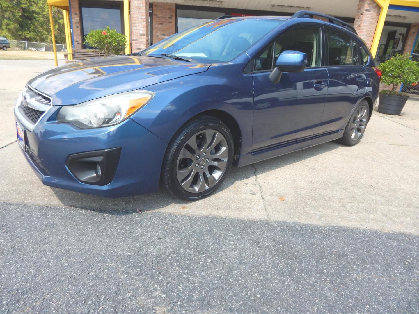 2013 Blue /Charcoal Subaru Impreza 2.0i Sport Premium (JF1GPAL61DH) with an 2.0L H4 DOHC 16V engine, Automatic transmission, located at 3120 W Tennessee St, Tallahassee, FL, 32304-1002, (850) 575-6702, 30.458841, -84.349648 - Used Car Supermarket is proud to present you with this loaded immaculate 2013 Subaru Impreza Premium Sport with low miles. Used Car Supermarket prides itself in offering you the finest pre-owned vehicle in Tallahassee. Used Car Supermarket has been locally family owned and operated for over 50 years - Photo#0