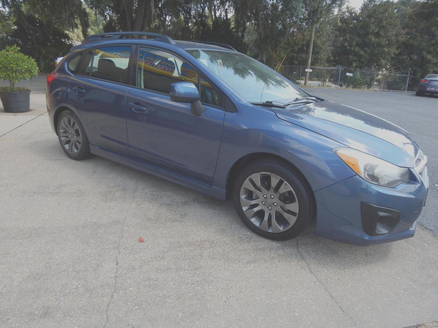 2013 Blue /Charcoal Subaru Impreza 2.0i Sport Premium (JF1GPAL61DH) with an 2.0L H4 DOHC 16V engine, Automatic transmission, located at 3120 W Tennessee St, Tallahassee, FL, 32304-1002, (850) 575-6702, 30.458841, -84.349648 - Used Car Supermarket is proud to present you with this loaded immaculate 2013 Subaru Impreza Premium Sport with low miles. Used Car Supermarket prides itself in offering you the finest pre-owned vehicle in Tallahassee. Used Car Supermarket has been locally family owned and operated for over 50 years - Photo#1