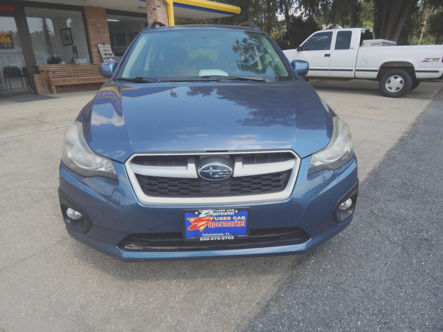 2013 Blue /Charcoal Subaru Impreza 2.0i Sport Premium (JF1GPAL61DH) with an 2.0L H4 DOHC 16V engine, Automatic transmission, located at 3120 W Tennessee St, Tallahassee, FL, 32304-1002, (850) 575-6702, 30.458841, -84.349648 - Used Car Supermarket is proud to present you with this loaded immaculate 2013 Subaru Impreza Premium Sport with low miles. Used Car Supermarket prides itself in offering you the finest pre-owned vehicle in Tallahassee. Used Car Supermarket has been locally family owned and operated for over 50 years - Photo#2