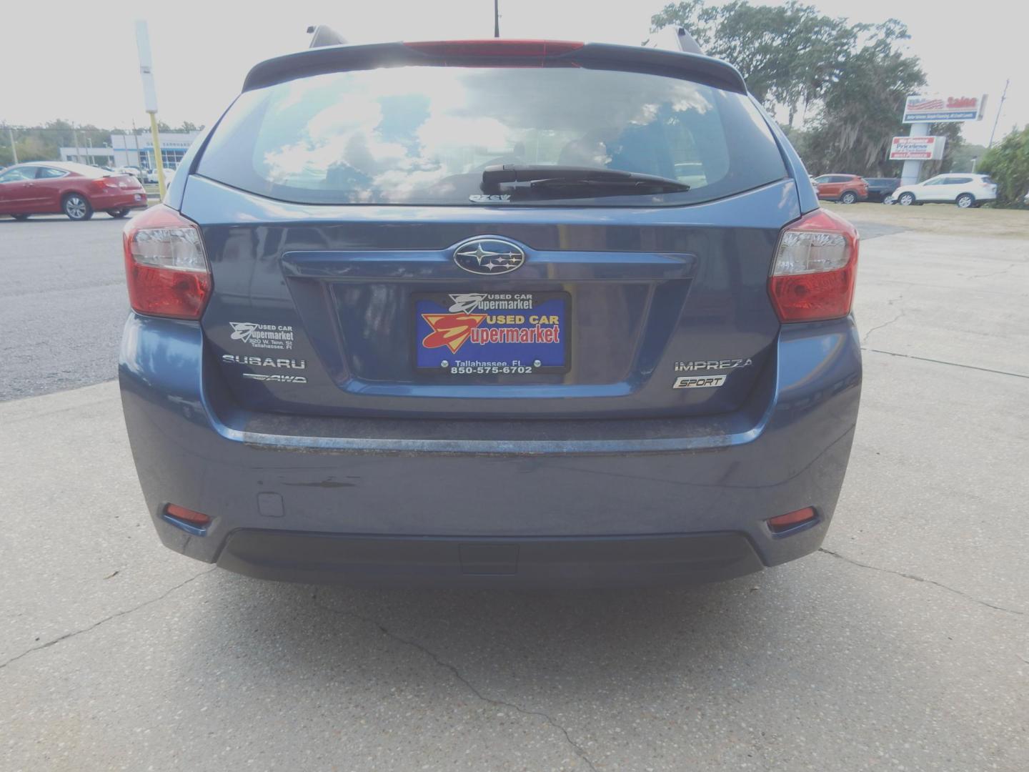 2013 Blue /Charcoal Subaru Impreza 2.0i Sport Premium (JF1GPAL61DH) with an 2.0L H4 DOHC 16V engine, Automatic transmission, located at 3120 W Tennessee St, Tallahassee, FL, 32304-1002, (850) 575-6702, 30.458841, -84.349648 - Used Car Supermarket is proud to present you with this loaded immaculate 2013 Subaru Impreza Premium Sport with low miles. Used Car Supermarket prides itself in offering you the finest pre-owned vehicle in Tallahassee. Used Car Supermarket has been locally family owned and operated for over 50 years - Photo#3