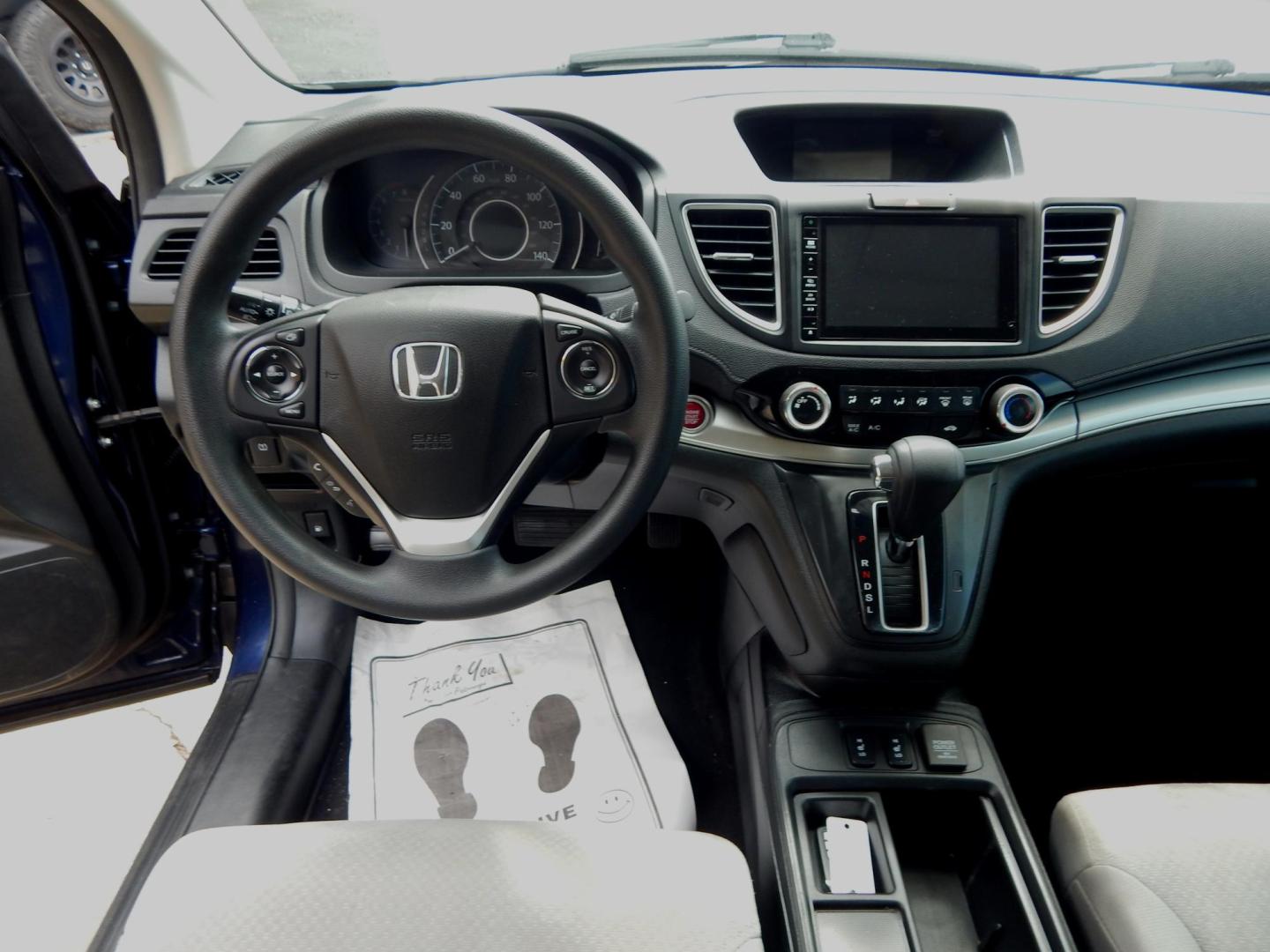 2016 Blue /Gray Honda CR-V EX 2WD (3CZRM3H55GG) with an 2.4L L4 DOHC 16V engine, CVT transmission, located at 3120 W Tennessee St, Tallahassee, FL, 32304-1002, (850) 575-6702, 30.458841, -84.349648 - Used Car Supermarket is proud to present you with this loaded immaculate 2016 Honda CRV EX with sunroof. Used Car Supermarket prides itself in offering you the finest pre-owned vehicle in Tallahassee. Used Car Supermarket has been locally family owned and operated for over 50 years. Our CRV EX has b - Photo#4