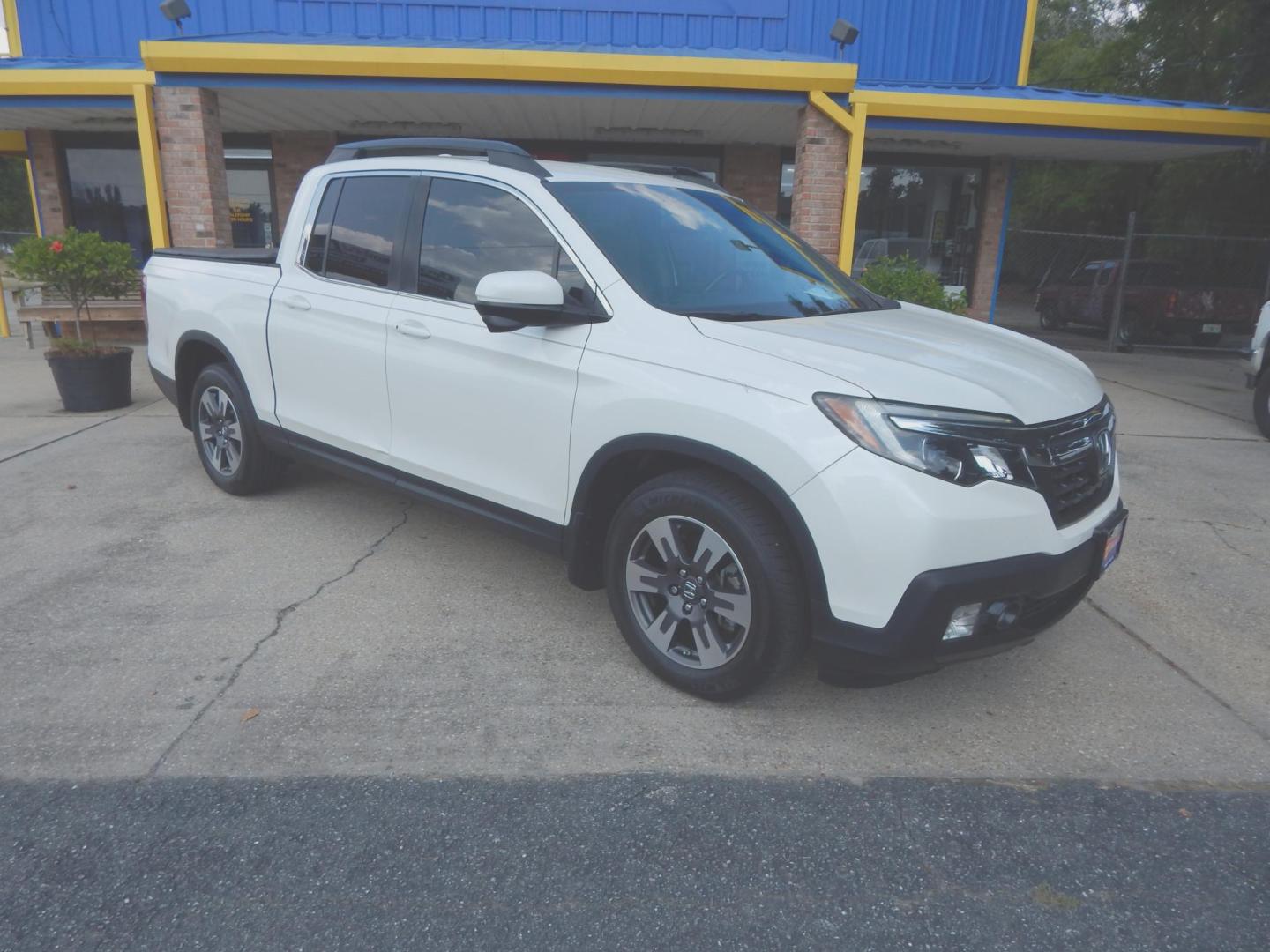2017 Pearl White /Gray Leather Honda Ridgeline RTL-T (5FPYK2F64HB) with an 3.5L V6 SOHC 24V engine, Automatic transmission, located at 3120 W Tennessee St, Tallahassee, FL, 32304-1002, (850) 575-6702, 30.458841, -84.349648 - Used Car Supermarket is proud to present you with this loaded immaculate 2017 Honda Ridgeline RLT-T with Navigation and leather. Used Car Supermarket prides itself in offering you the finest pre-owned vehicle in Tallahassee. Used Car Supermarket has been locally family owned and operated for over 50 - Photo#0