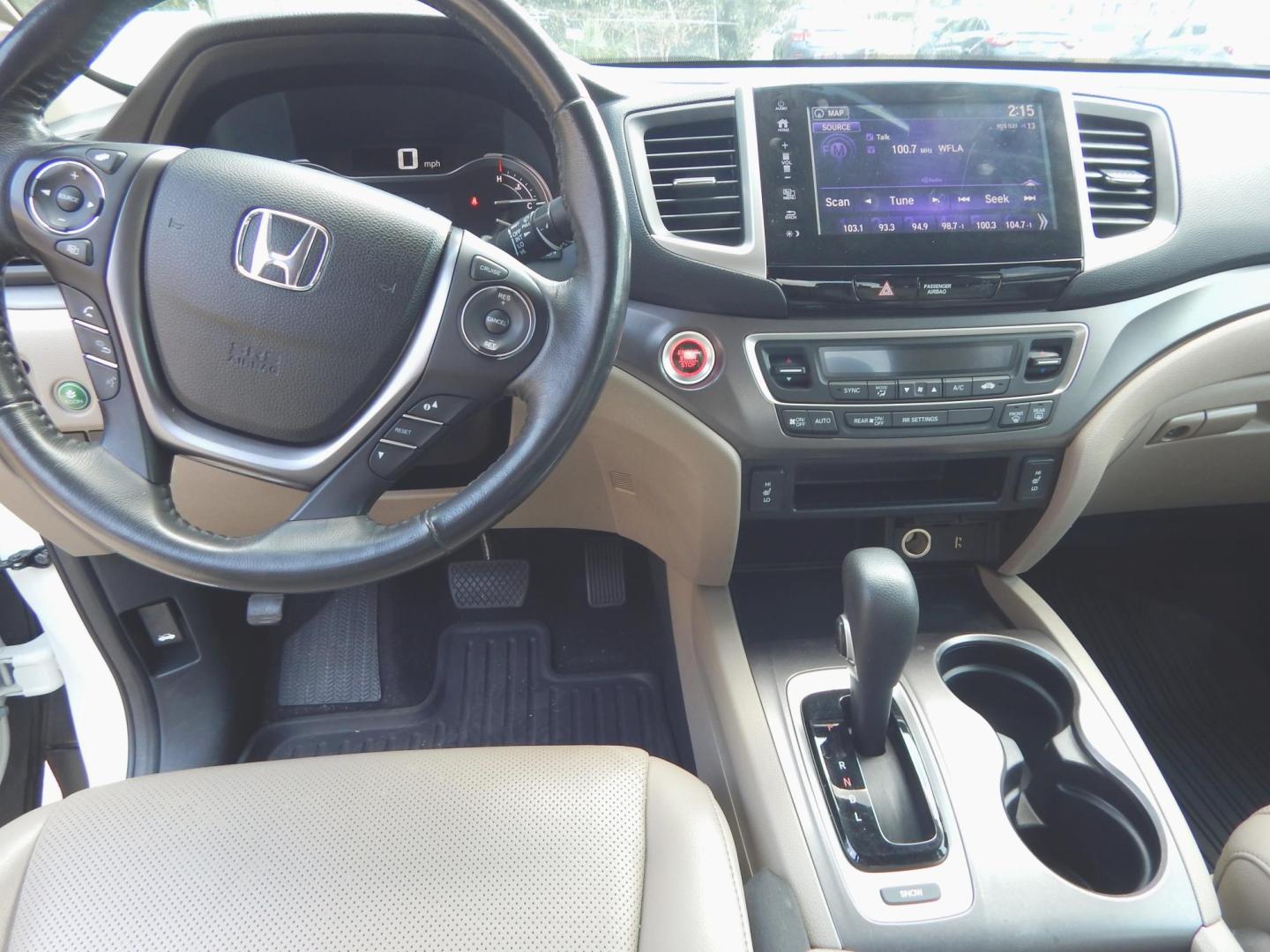 2017 Pearl White /Gray Leather Honda Ridgeline RTL-T (5FPYK2F64HB) with an 3.5L V6 SOHC 24V engine, Automatic transmission, located at 3120 W Tennessee St, Tallahassee, FL, 32304-1002, (850) 575-6702, 30.458841, -84.349648 - Used Car Supermarket is proud to present you with this loaded immaculate 2017 Honda Ridgeline RLT-T with Navigation and leather. Used Car Supermarket prides itself in offering you the finest pre-owned vehicle in Tallahassee. Used Car Supermarket has been locally family owned and operated for over 50 - Photo#5