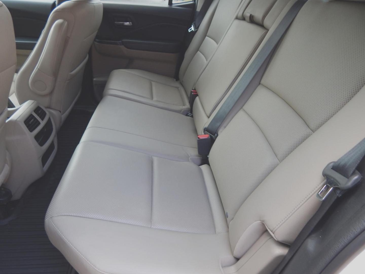 2017 Pearl White /Gray Leather Honda Ridgeline RTL-T (5FPYK2F64HB) with an 3.5L V6 SOHC 24V engine, Automatic transmission, located at 3120 W Tennessee St, Tallahassee, FL, 32304-1002, (850) 575-6702, 30.458841, -84.349648 - Used Car Supermarket is proud to present you with this loaded immaculate 2017 Honda Ridgeline RLT-T with Navigation and leather. Used Car Supermarket prides itself in offering you the finest pre-owned vehicle in Tallahassee. Used Car Supermarket has been locally family owned and operated for over 50 - Photo#7