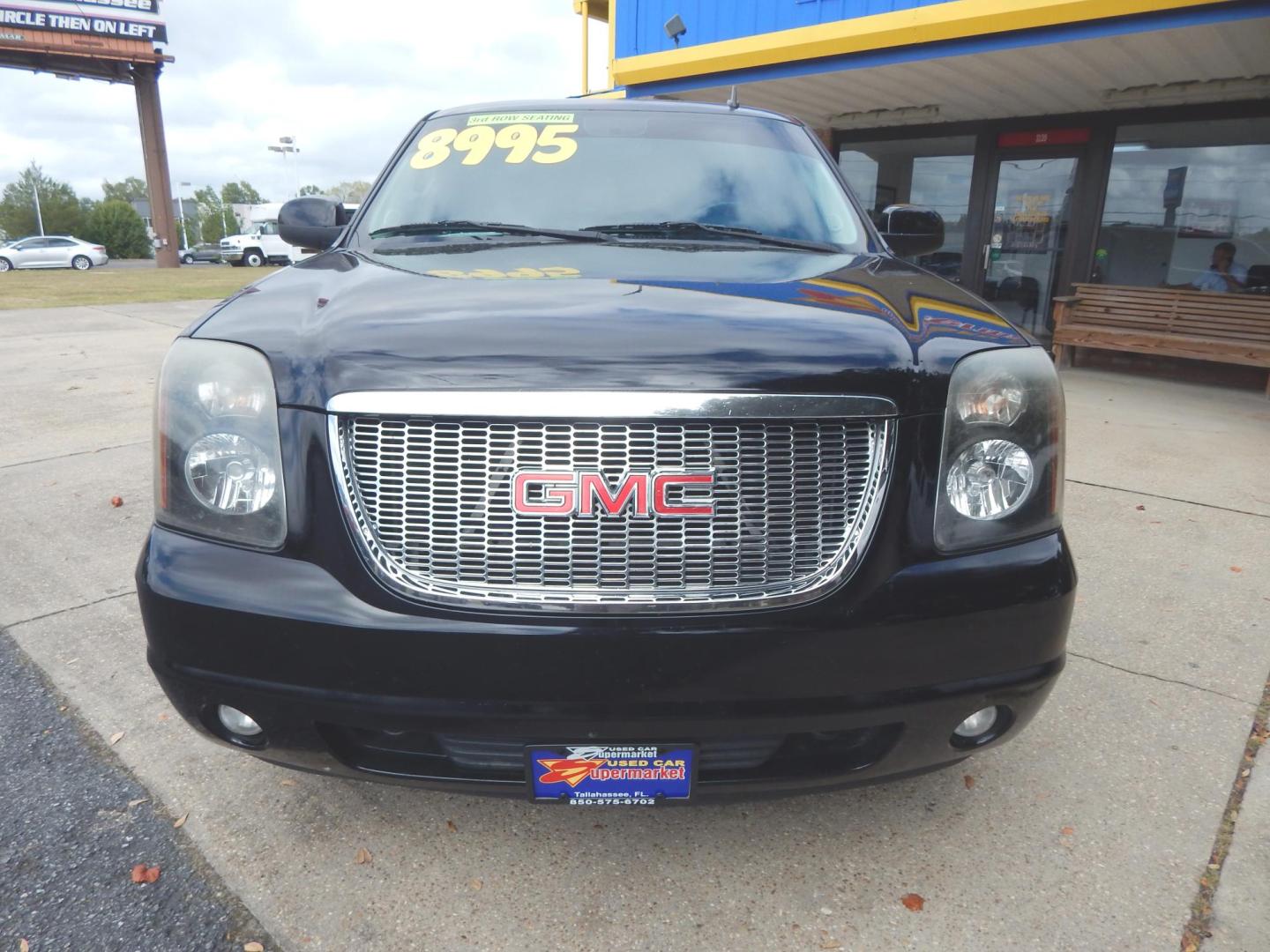 2013 Black /Charcoal GMC Yukon SLE 2WD (1GKS1AE00DR) with an 5.3L V8 OHV 16V FFV engine, 6-Speed Automatic transmission, located at 3120 W Tennessee St, Tallahassee, FL, 32304-1002, (850) 575-6702, 30.458841, -84.349648 - Used Car Supermarket is proud to present you with this loaded immaculate 2013 GMC Yukon SLE with 3rd row seating. Used Car Supermarket prides itself in offering you the finest pre-owned vehicle in Tallahassee. Used Car Supermarket has been locally family owned and operated for over 50 years. Our Yuk - Photo#2