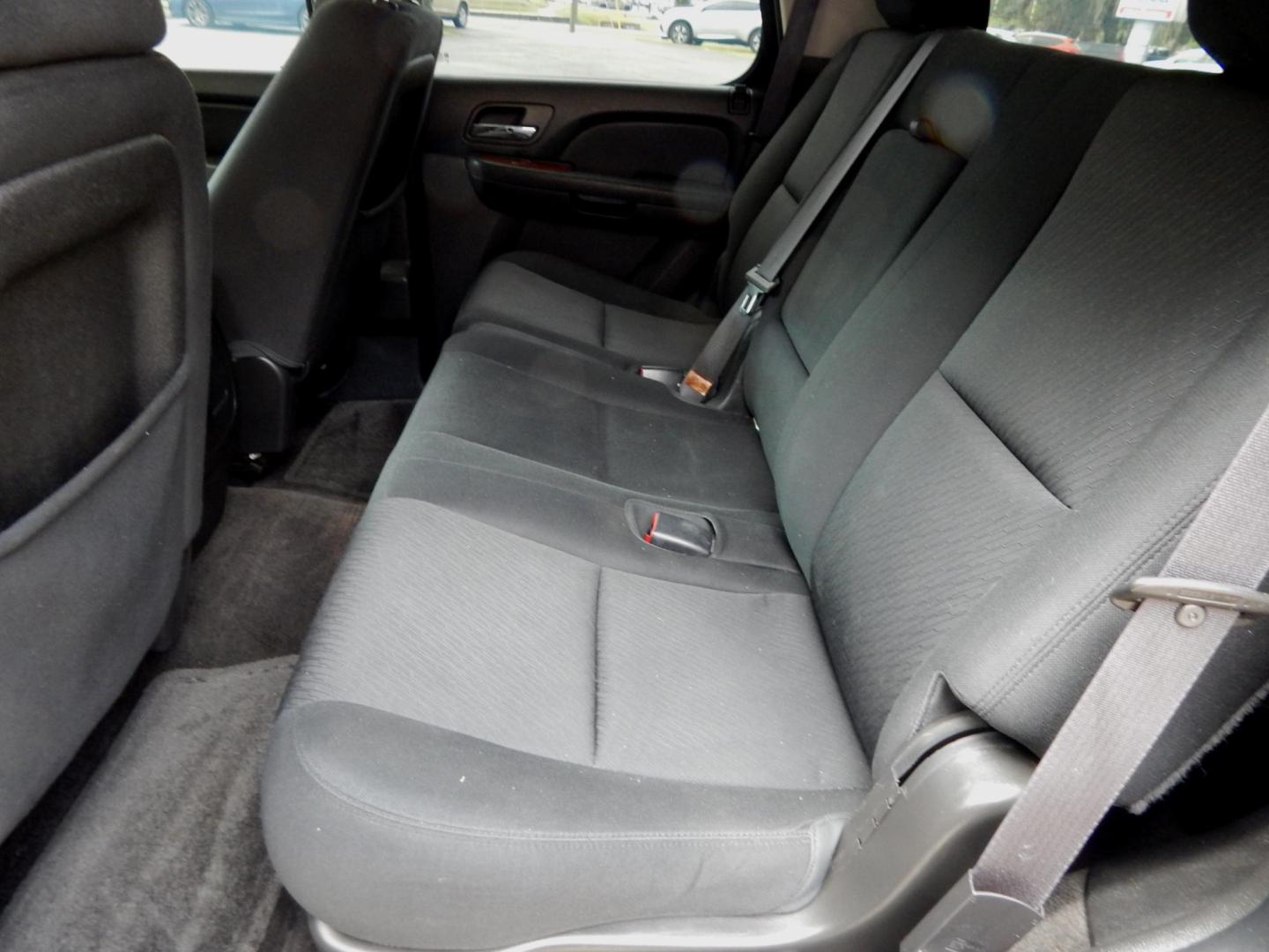 2013 Black /Charcoal GMC Yukon SLE 2WD (1GKS1AE00DR) with an 5.3L V8 OHV 16V FFV engine, 6-Speed Automatic transmission, located at 3120 W Tennessee St, Tallahassee, FL, 32304-1002, (850) 575-6702, 30.458841, -84.349648 - Used Car Supermarket is proud to present you with this loaded immaculate 2013 GMC Yukon SLE with 3rd row seating. Used Car Supermarket prides itself in offering you the finest pre-owned vehicle in Tallahassee. Used Car Supermarket has been locally family owned and operated for over 50 years. Our Yuk - Photo#6