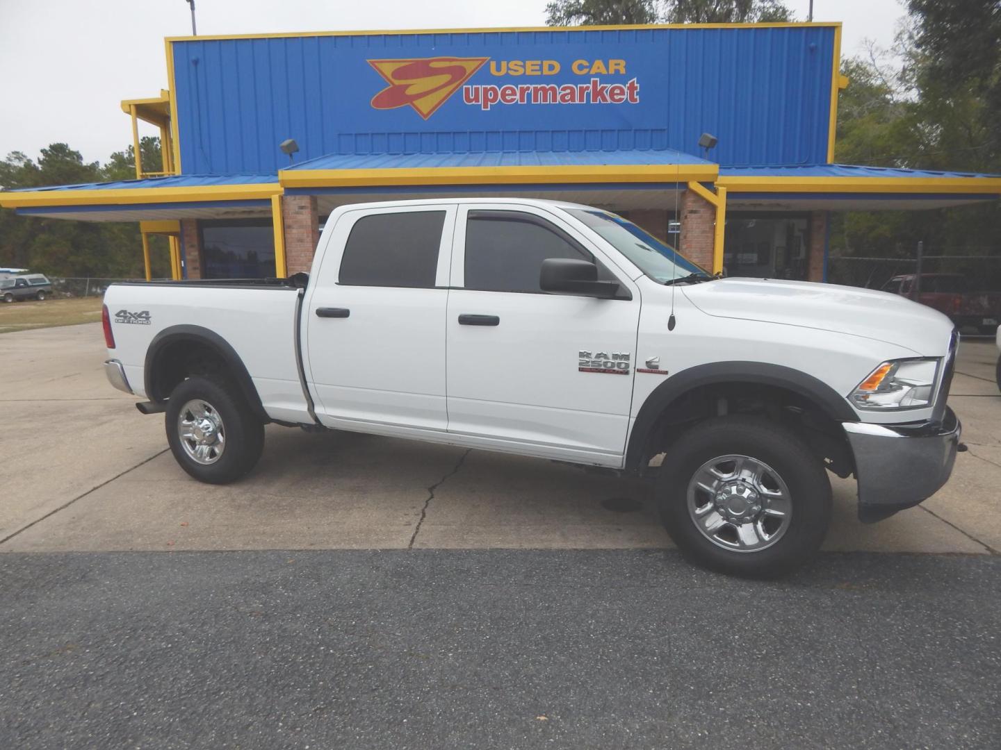 2018 White /Charcoal RAM 2500 Tradesman Crew Cab SWB 4WD (3C6UR5CL6JG) with an 6.7L L6 OHV 24V TURBO DIESEL engine, Automatic transmission, located at 3120 W Tennessee St, Tallahassee, FL, 32304-1002, (850) 575-6702, 30.458841, -84.349648 - Used Car Supermarket is proud to present you with this loaded immaculate 2018 Ram 2500 Crew Cab Diesel 6.7L 4x4. Used Car Supermarket prides itself in offering you the finest pre-owned vehicle in Tallahassee. Used Car Supermarket has been locally family owned and operated for over 50 years. Our Ram - Photo#0