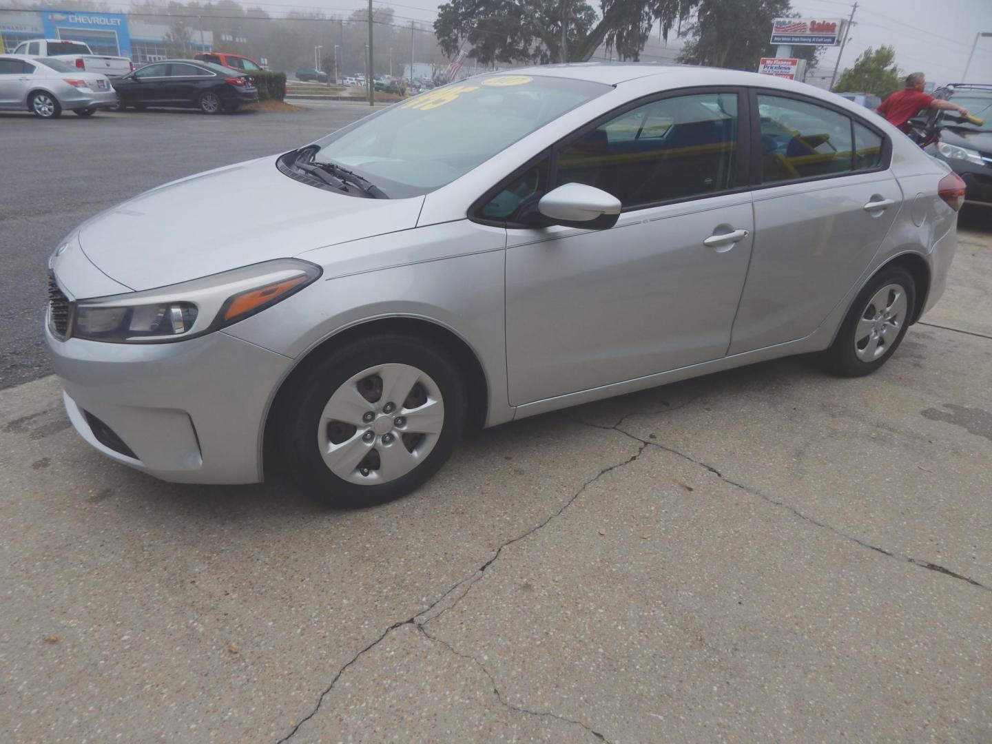2017 Silver Metallic /Gray Kia Forte LX (3KPFK4A73HE) with an 2.0L L4 DOHC 16V engine, manual transmission, located at 3120 W Tennessee St, Tallahassee, FL, 32304-1002, (850) 575-6702, 30.458841, -84.349648 - Used Car Supermarket is proud to present you with this loaded immaculate 2017 Kia Forte LX Sedan. Used Car Supermarket prides itself in offering you the finest pre-owned vehicle in Tallahassee. Used Car Supermarket has been locally family owned and operated for over 50 years. Our Forte LX has been s - Photo#1