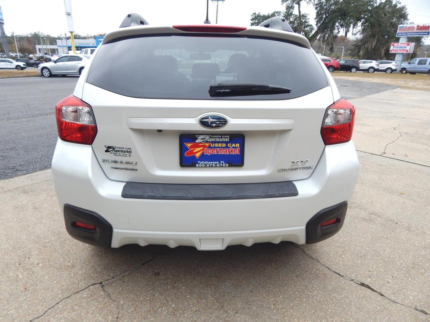 2014 Pearl White /Gray Leather Subaru XV Crosstrek 2.0 Limited (JF2GPAGCXE8) with an 2.0L L4 DOHC 16V engine, CVT Automatic transmission, located at 3120 W Tennessee St, Tallahassee, FL, 32304-1002, (850) 575-6702, 30.458841, -84.349648 - Used Car Supermarket is proud to present you with this loaded immaculate 2014 Subaru Crosstrek Limited with leather and low miles. Used Car Supermarket prides itself in offering you the finest pre-owned vehicle in Tallahassee. Used Car Supermarket has been locally family owned and operated for over - Photo#3