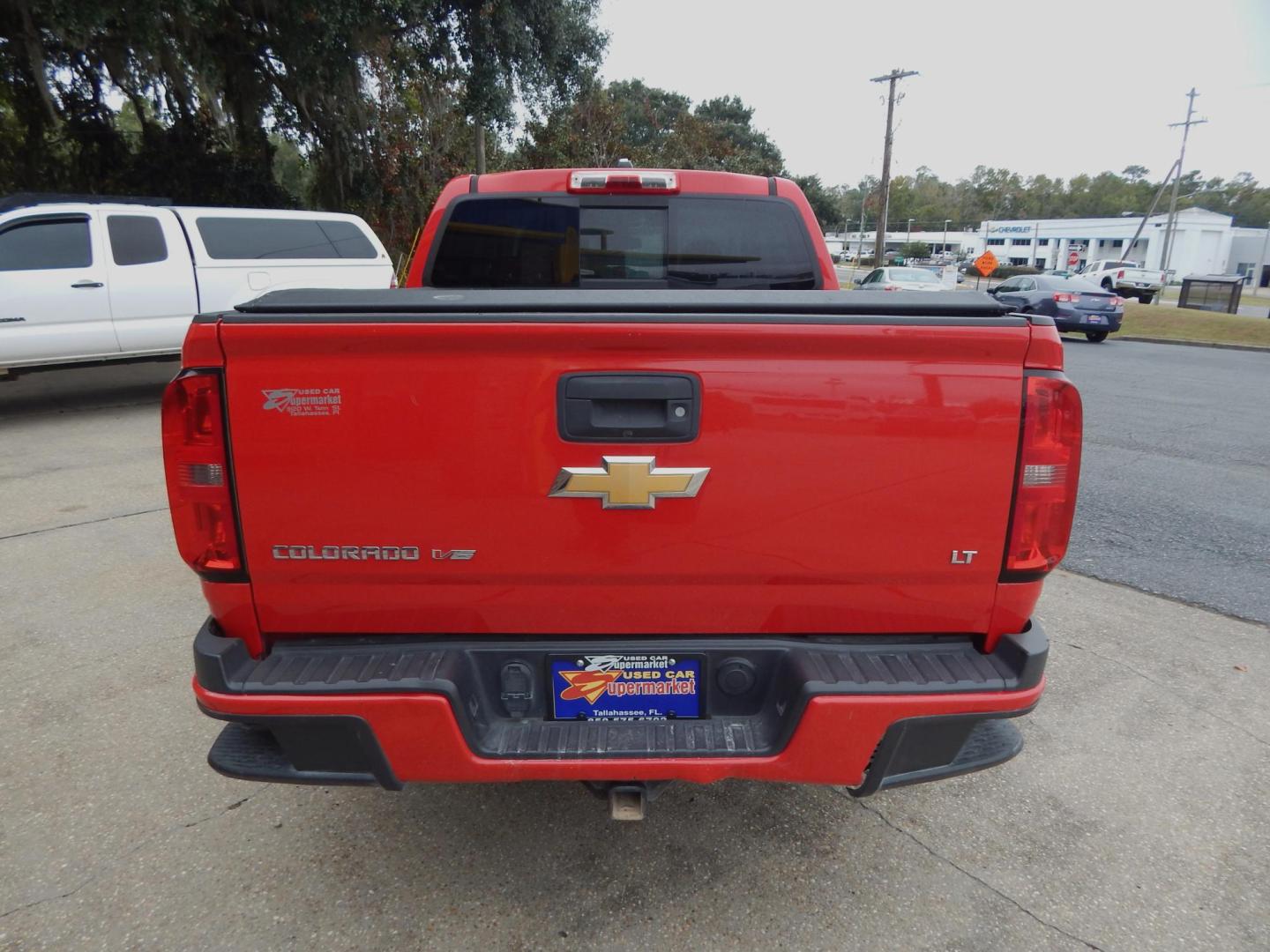 2017 Red /Charcoal Chevrolet Colorado LT Crew Cab 2WD Long Box (1GCGSCENXH1) with an 3.6L V6 DOHC 24V GAS engine, Automatic transmission, located at 3120 W Tennessee St, Tallahassee, FL, 32304-1002, (850) 575-6702, 30.458841, -84.349648 - Used Car Supermarket is proud to present you with this loaded immaculate 2017 Chevy Colorado LT Crew Cab 3.6L. Used Car Supermarket prides itself in offering you the finest pre-owned vehicle in Tallahassee. Used Car Supermarket has been locally family owned and operated for over 50 years. Our Colora - Photo#3