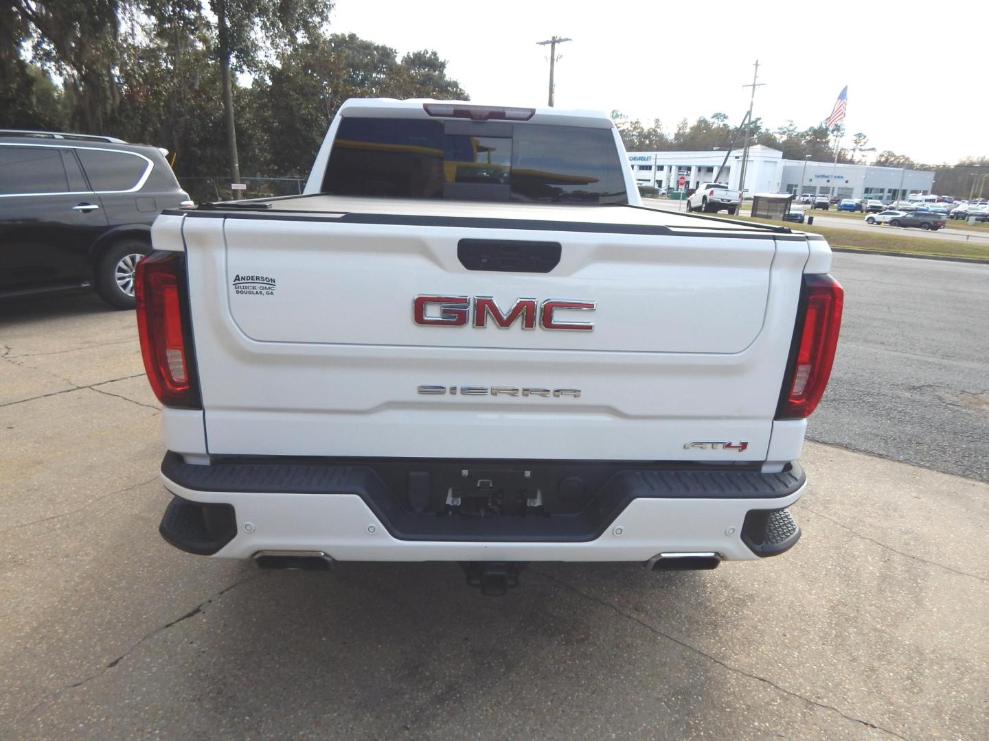 2021 White /Charcoal Leather GMC Sierra 1500 AT4 Crew Cab Short Box 4WD (3GTP9EEL7MG) with an 6.2L V8 OHV 16V engine, Automatic transmission, located at 3120 W Tennessee St, Tallahassee, FL, 32304-1002, (850) 575-6702, 30.458841, -84.349648 - Used Car Supermarket is proud to present you with this loaded immaculate 2021 GMC Sierra Crew Cab AT4 4x4 with leather, sunroof and Navigation. Used Car Supermarket prides itself in offering you the finest pre-owned vehicle in Tallahassee. Used Car Supermarket has been locally family owned and opera - Photo#3