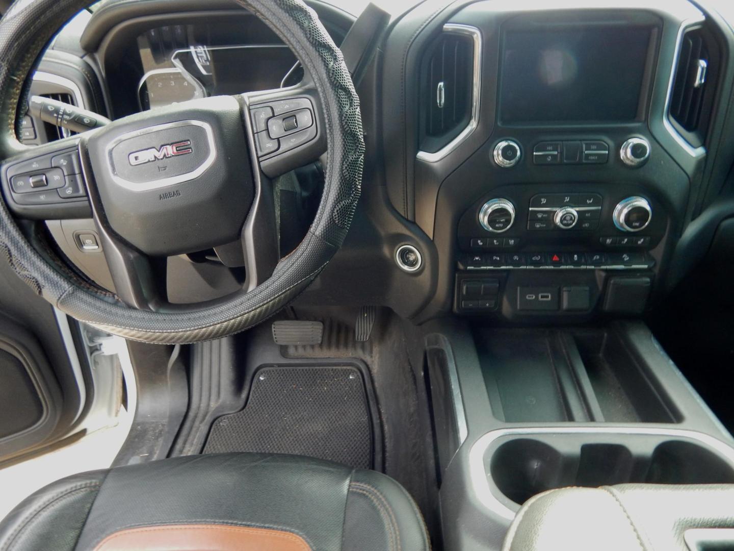 2021 White /Charcoal Leather GMC Sierra 1500 AT4 Crew Cab Short Box 4WD (3GTP9EEL7MG) with an 6.2L V8 OHV 16V engine, Automatic transmission, located at 3120 W Tennessee St, Tallahassee, FL, 32304-1002, (850) 575-6702, 30.458841, -84.349648 - Used Car Supermarket is proud to present you with this loaded immaculate 2021 GMC Sierra Crew Cab AT4 4x4 with leather, sunroof and Navigation. Used Car Supermarket prides itself in offering you the finest pre-owned vehicle in Tallahassee. Used Car Supermarket has been locally family owned and opera - Photo#6