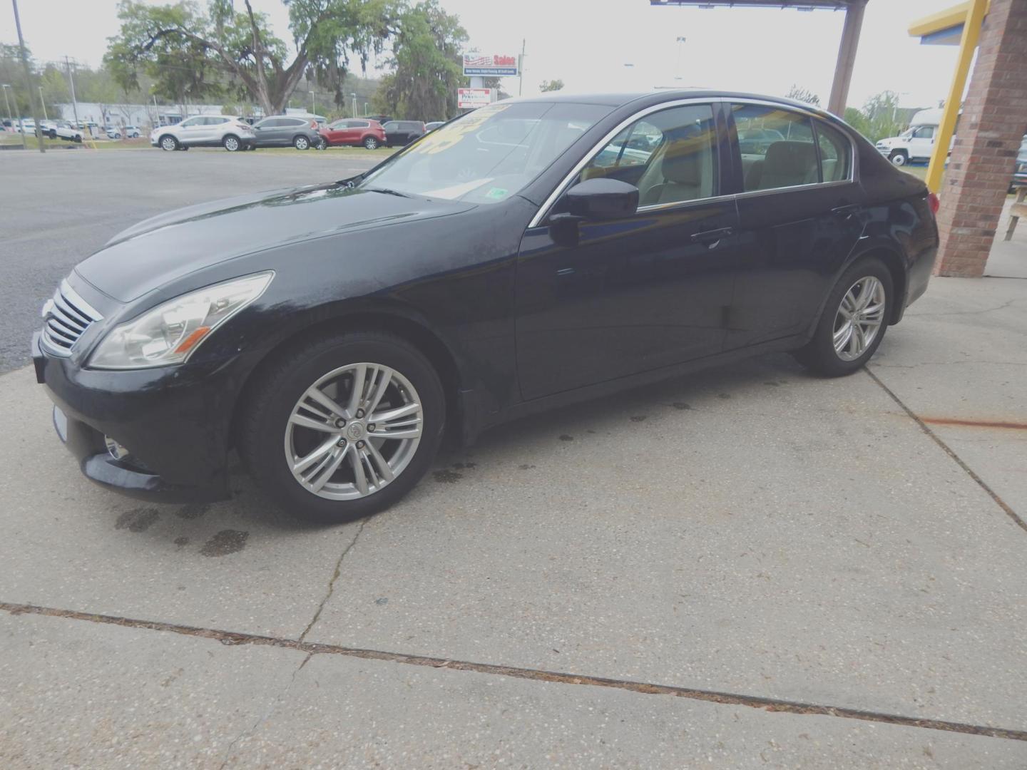 2013 Black /Tan Leather Infiniti G Sedan 37x AWD (JN1CV6ARXDM) with an 3.7L V6 DOHC 24V engine, 5-Speed Automatic transmission, located at 3120 W Tennessee St, Tallahassee, FL, 32304-1002, (850) 575-6702, 30.458841, -84.349648 - Used Car Supermarket is proud to present you with this loaded immaculate 2013 Infiniti G37X sedan with Navigation, sunroof and leather. Used Car Supermarket prides itself in offering you the finest pre-owned vehicle in Tallahassee. Used Car Supermarket has been locally family owned and operated for - Photo#1