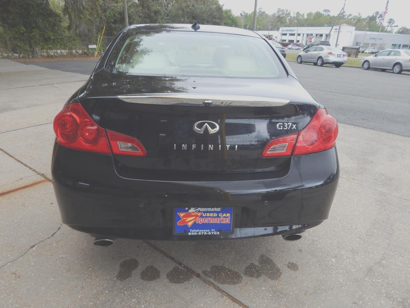 2013 Black /Tan Leather Infiniti G Sedan 37x AWD (JN1CV6ARXDM) with an 3.7L V6 DOHC 24V engine, 5-Speed Automatic transmission, located at 3120 W Tennessee St, Tallahassee, FL, 32304-1002, (850) 575-6702, 30.458841, -84.349648 - Used Car Supermarket is proud to present you with this loaded immaculate 2013 Infiniti G37X sedan with Navigation, sunroof and leather. Used Car Supermarket prides itself in offering you the finest pre-owned vehicle in Tallahassee. Used Car Supermarket has been locally family owned and operated for - Photo#3
