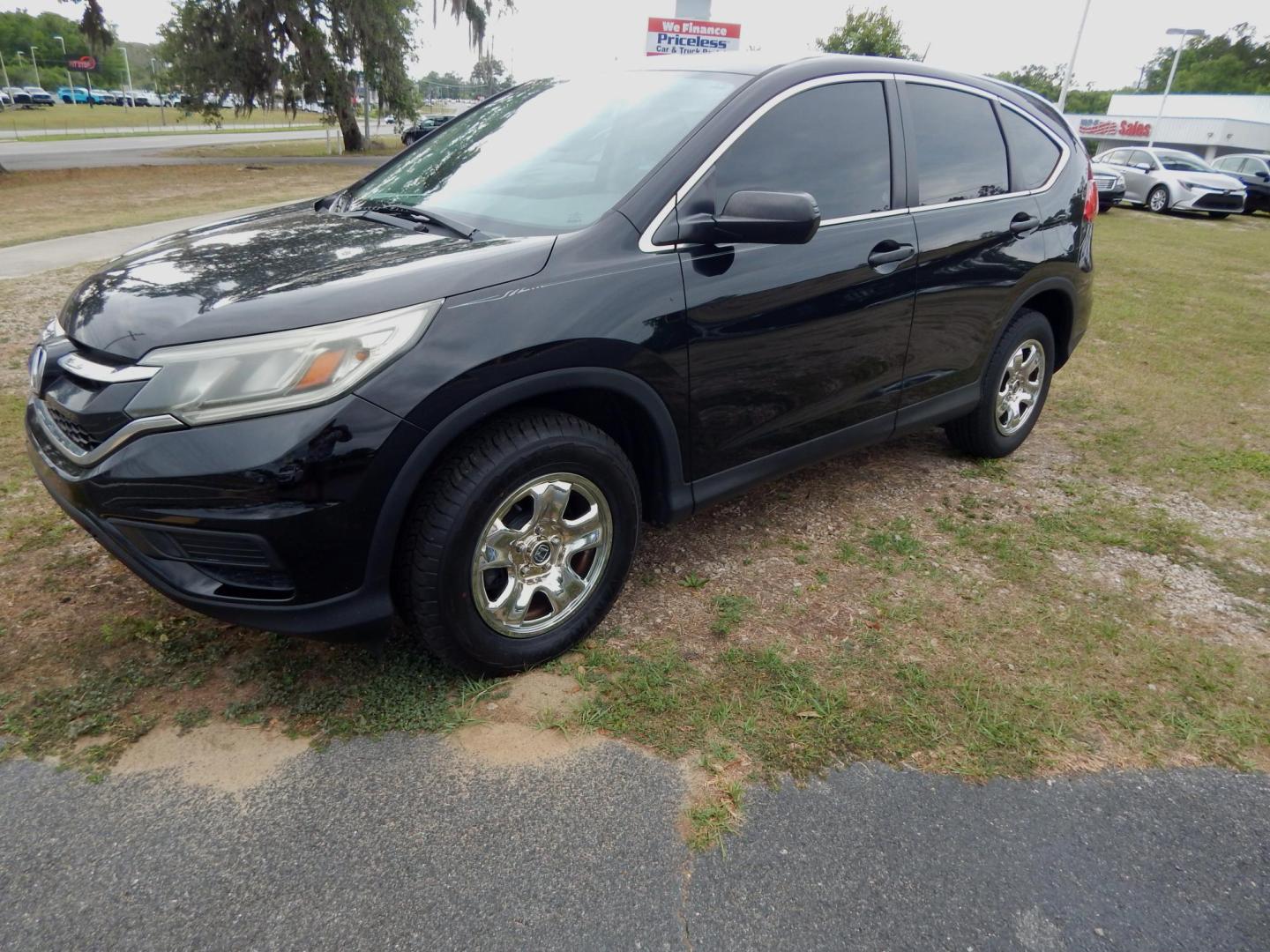 2016 Black /Charcoal Honda CR-V LX 2WD (2HKRM3H38GH) with an 2.4L L4 DOHC 16V engine, CVT transmission, located at 3120 W Tennessee St, Tallahassee, FL, 32304-1002, (850) 575-6702, 30.458841, -84.349648 - Used Car Supermarket is proud to present you with this loaded immaculate 2016 Honda CRV LX. Used Car Supermarket prides itself in offering you the finest pre-owned vehicle in Tallahassee. Used Car Supermarket has been locally family owned and operated for over 50 years. Our CRV LX has been serviced - Photo#0
