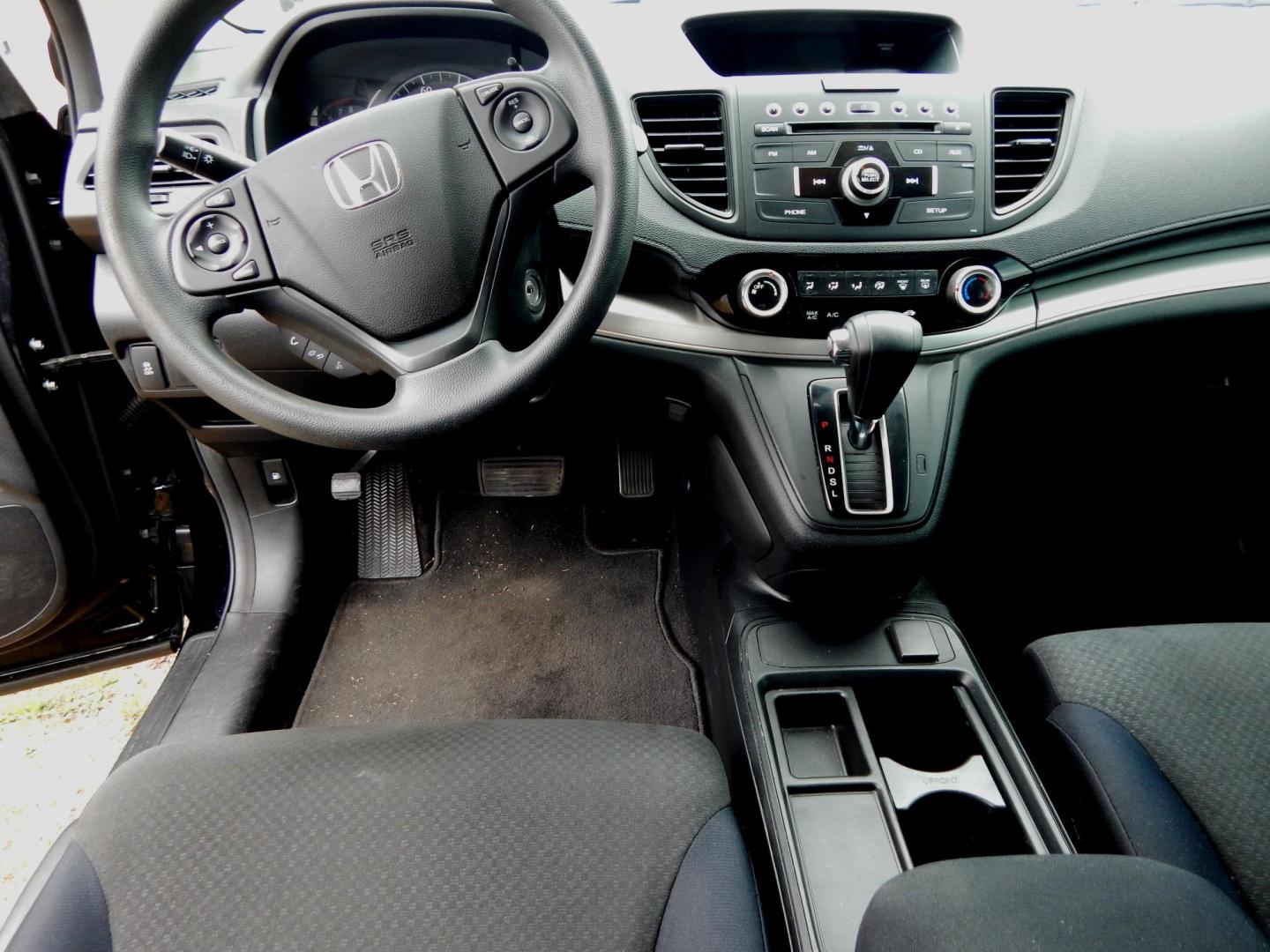 2016 Black /Charcoal Honda CR-V LX 2WD (2HKRM3H38GH) with an 2.4L L4 DOHC 16V engine, CVT transmission, located at 3120 W Tennessee St, Tallahassee, FL, 32304-1002, (850) 575-6702, 30.458841, -84.349648 - Used Car Supermarket is proud to present you with this loaded immaculate 2016 Honda CRV LX. Used Car Supermarket prides itself in offering you the finest pre-owned vehicle in Tallahassee. Used Car Supermarket has been locally family owned and operated for over 50 years. Our CRV LX has been serviced - Photo#3
