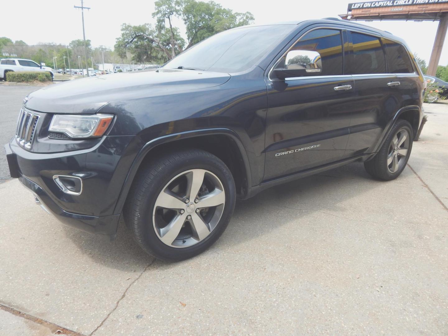 2014 Black /Charcoal Leather Jeep Grand Cherokee Overland 4WD (1C4RJFCG8EC) with an 3.6L V6 DOHC 24V engine, Automatic transmission, located at 3120 W Tennessee St, Tallahassee, FL, 32304-1002, (850) 575-6702, 30.458841, -84.349648 - Used Car Supermarket is proud to present you with this loaded immaculate 2014 Jeep Grand Cherokee Overland 4X4 with leather, Navigation and low miles. Used Car Supermarket prides itself in offering you the finest pre-owned vehicle in Tallahassee. Used Car Supermarket has been locally family owned an - Photo#1
