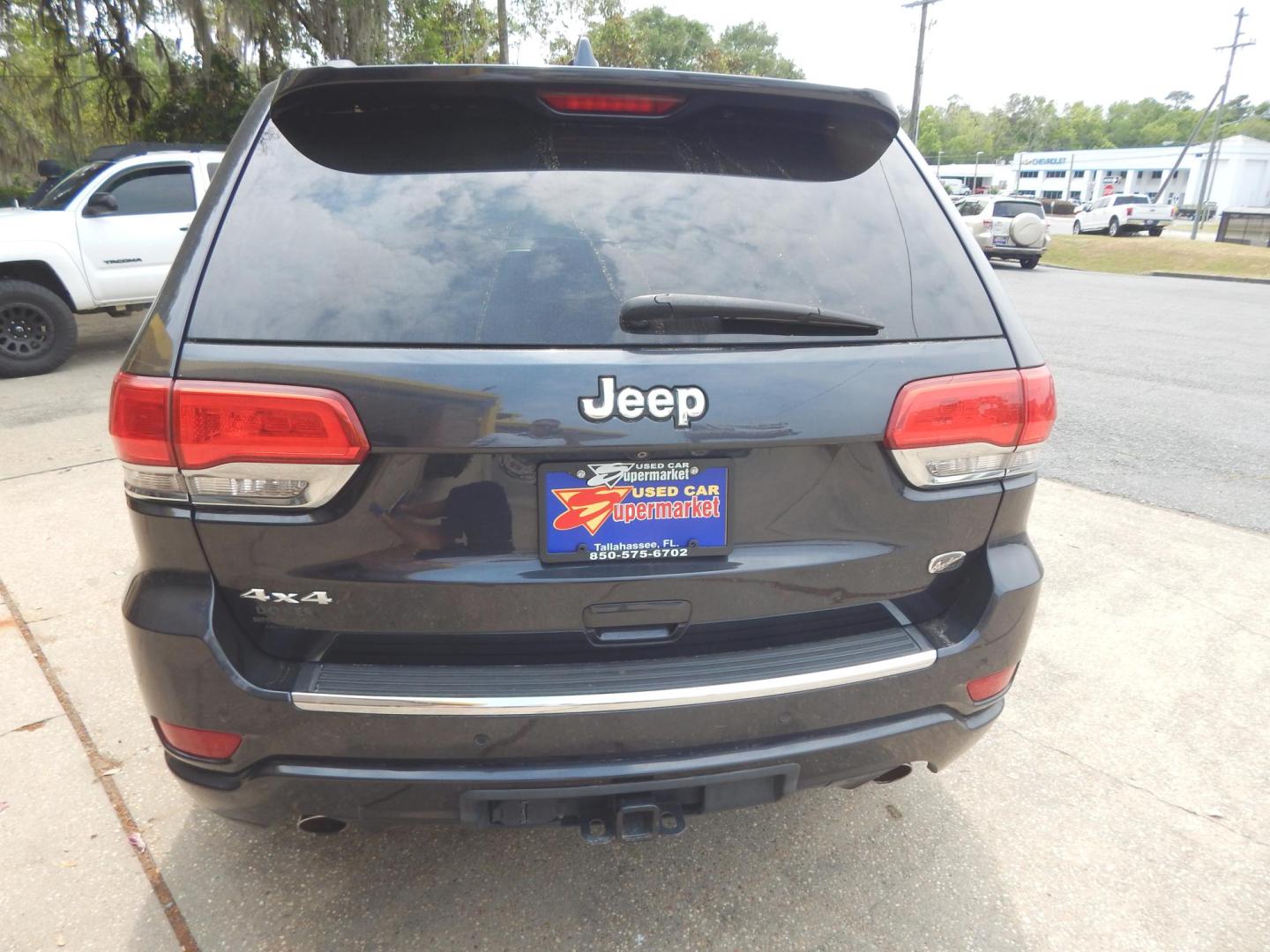 2014 Black /Charcoal Leather Jeep Grand Cherokee Overland 4WD (1C4RJFCG8EC) with an 3.6L V6 DOHC 24V engine, Automatic transmission, located at 3120 W Tennessee St, Tallahassee, FL, 32304-1002, (850) 575-6702, 30.458841, -84.349648 - Used Car Supermarket is proud to present you with this loaded immaculate 2014 Jeep Grand Cherokee Overland 4X4 with leather, Navigation and low miles. Used Car Supermarket prides itself in offering you the finest pre-owned vehicle in Tallahassee. Used Car Supermarket has been locally family owned an - Photo#3