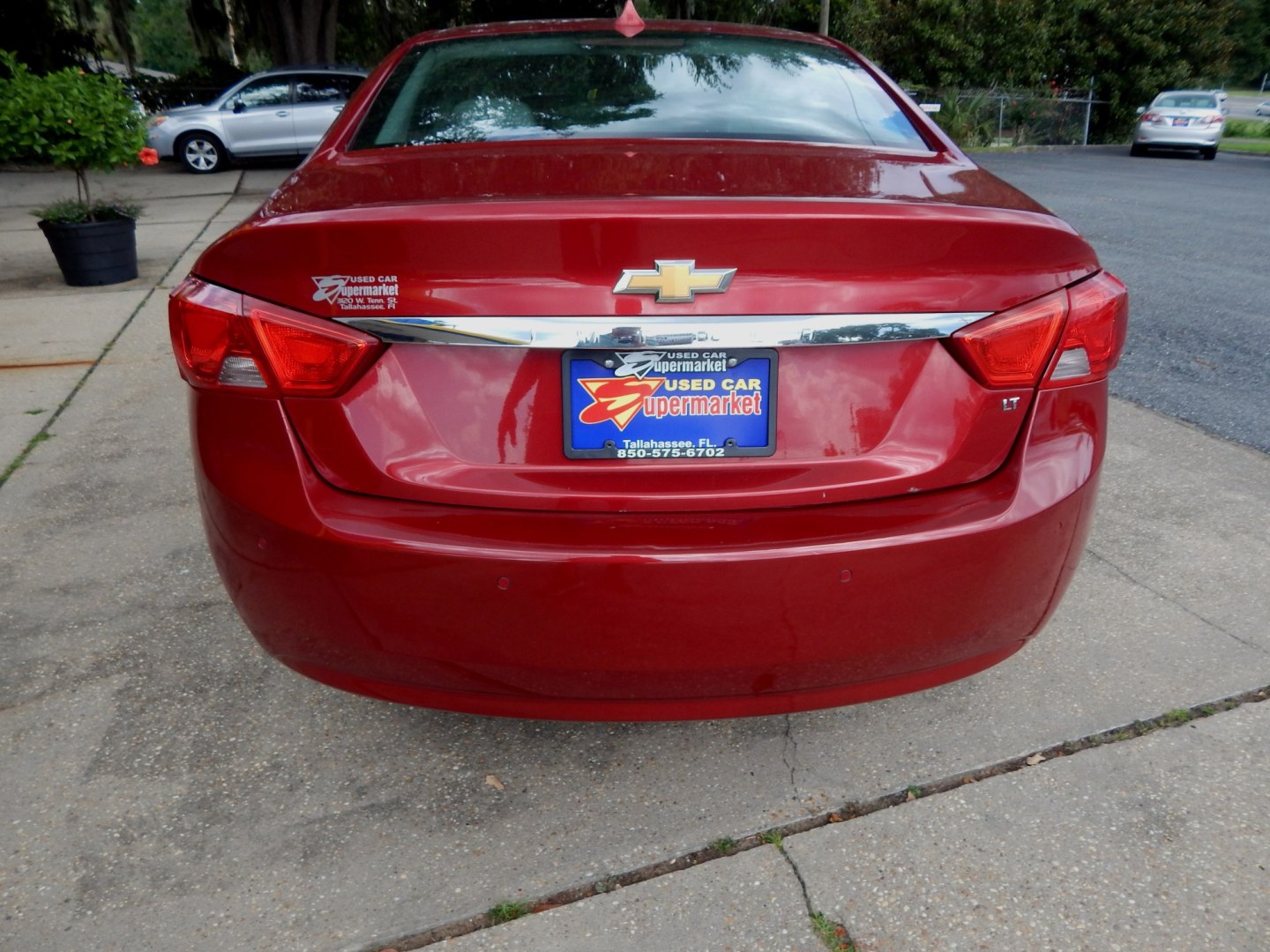 2014 Maroon /Gray Leather Chevrolet Impala 2LT (2G1125S32E9) with an 3.6L V6 DOHC 16V FFV engine, Automatic transmission, located at 3120 W Tennessee St, Tallahassee, FL, 32304-1002, (850) 575-6702, 30.458841, -84.349648 - Used Car Supermarket is proud to present you with this loaded immaculate 2014 Chevy Impala 2LT with leather and low miles. Used Car Supermarket prides itself in offering you the finest pre-owned vehicle in Tallahassee. Used Car Supermarket has been locally family owned and operated for over 50 years- Photo#2