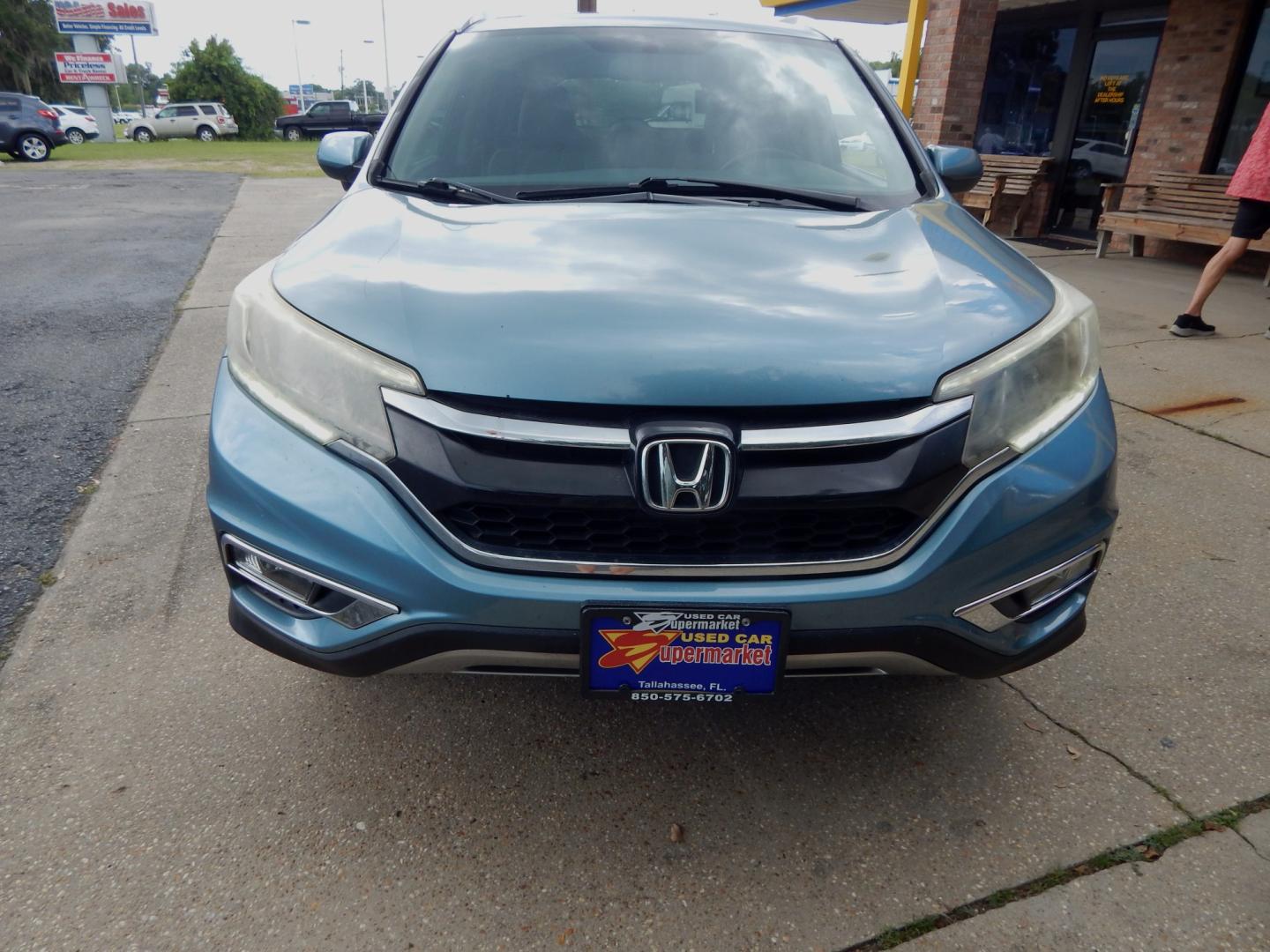 2015 Teal /Tan Leather Honda CR-V EX-L 2WD (2HKRM3H76FH) with an 2.4L L4 DOHC 16V engine, Continuously Variable Transmission transmission, located at 3120 W Tennessee St, Tallahassee, FL, 32304-1002, (850) 575-6702, 30.458841, -84.349648 - Used Car Supermarket is proud to present you with this loaded immaculate 2015 Honda CRV EX-L with leather, Navigation and sunroof. Used Car Supermarket prides itself in offering you the finest pre-owned vehicle in Tallahassee. Used Car Supermarket has been locally family owned and operated for over- Photo#2