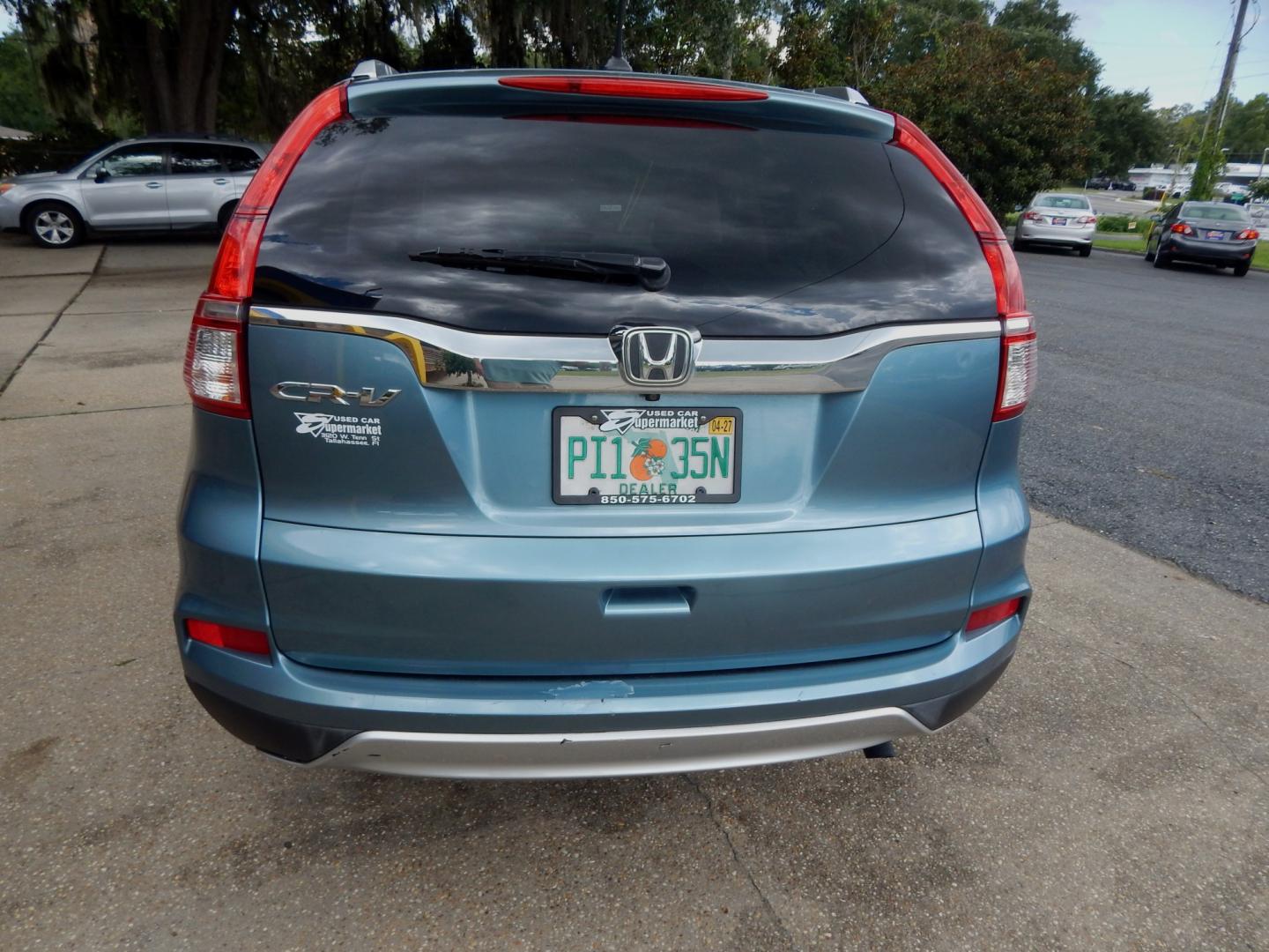 2015 Teal /Tan Leather Honda CR-V EX-L 2WD (2HKRM3H76FH) with an 2.4L L4 DOHC 16V engine, Continuously Variable Transmission transmission, located at 3120 W Tennessee St, Tallahassee, FL, 32304-1002, (850) 575-6702, 30.458841, -84.349648 - Used Car Supermarket is proud to present you with this loaded immaculate 2015 Honda CRV EX-L with leather, Navigation and sunroof. Used Car Supermarket prides itself in offering you the finest pre-owned vehicle in Tallahassee. Used Car Supermarket has been locally family owned and operated for over- Photo#3