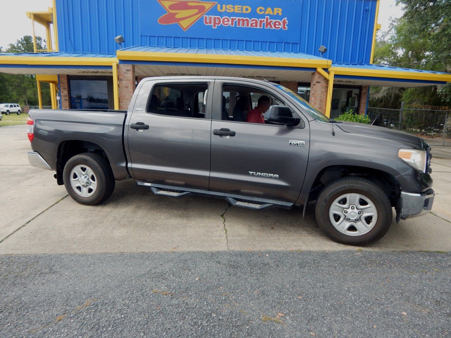 2015 Charcoal /Gray Toyota Tundra SR5 5.7L V8 CrewMax 4WD (5TFDY5F10FX) with an 5.7L V8 DOHC 32V engine, 6-Speed Automatic transmission, located at 3120 W Tennessee St, Tallahassee, FL, 32304-1002, (850) 575-6702, 30.458841, -84.349648 - Used Car Supermarket is proud to present you with this loaded immaculate 2015 Toyota Tundra Crew Max SR5 4x4 with low miles. Used Car Supermarket prides itself in offering you the finest pre-owned vehicle in Tallahassee. Used Car Supermarket has been locally family owned and operated for over 50 yea- Photo#0