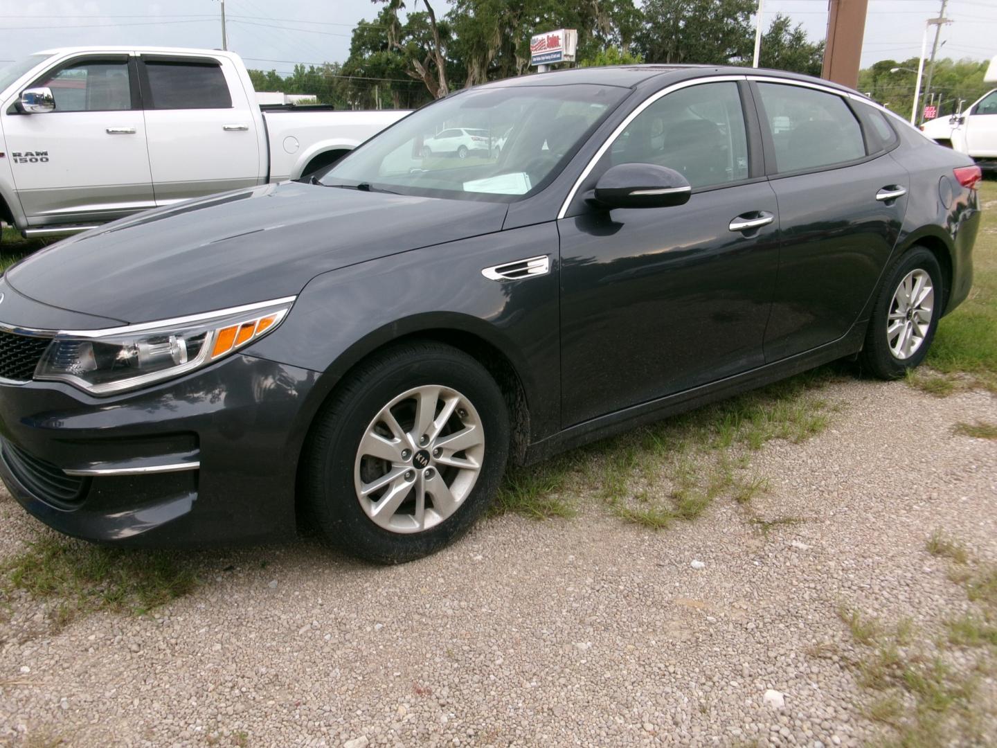 2018 Charcoal /Gray KIA Optima LX LX (KNAGTUL39J5) with an 2.4L L4 DOHC 16V engine, Automatic transmission, located at 3120 W Tennessee St, Tallahassee, FL, 32304-1002, (850) 575-6702, 30.458841, -84.349648 - Used Car Supermarket is proud to present you with this loaded immaculate 2018 Kia Optima LX. Used Car Supermarket prides itself in offering you the finest pre-owned vehicle in Tallahassee. Used Car Supermarket has been locally family owned and operated for over 50 years. Our Optima LX has been servi- Photo#0