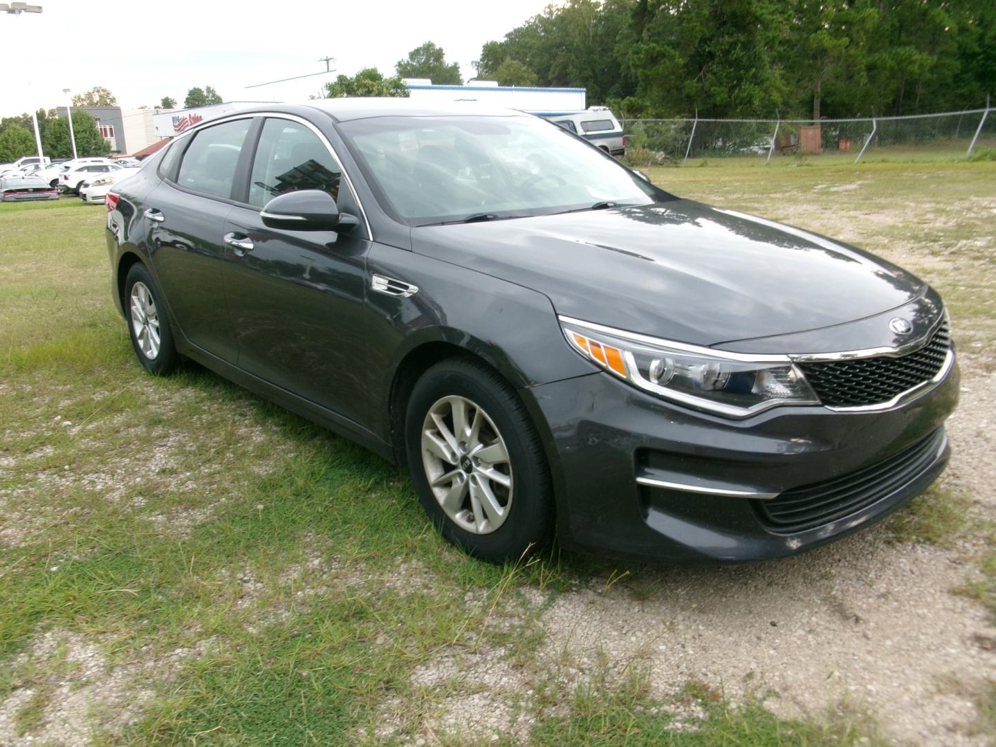 2018 Charcoal /Gray KIA Optima LX LX (KNAGTUL39J5) with an 2.4L L4 DOHC 16V engine, Automatic transmission, located at 3120 W Tennessee St, Tallahassee, FL, 32304-1002, (850) 575-6702, 30.458841, -84.349648 - Used Car Supermarket is proud to present you with this loaded immaculate 2018 Kia Optima LX. Used Car Supermarket prides itself in offering you the finest pre-owned vehicle in Tallahassee. Used Car Supermarket has been locally family owned and operated for over 50 years. Our Optima LX has been servi- Photo#2