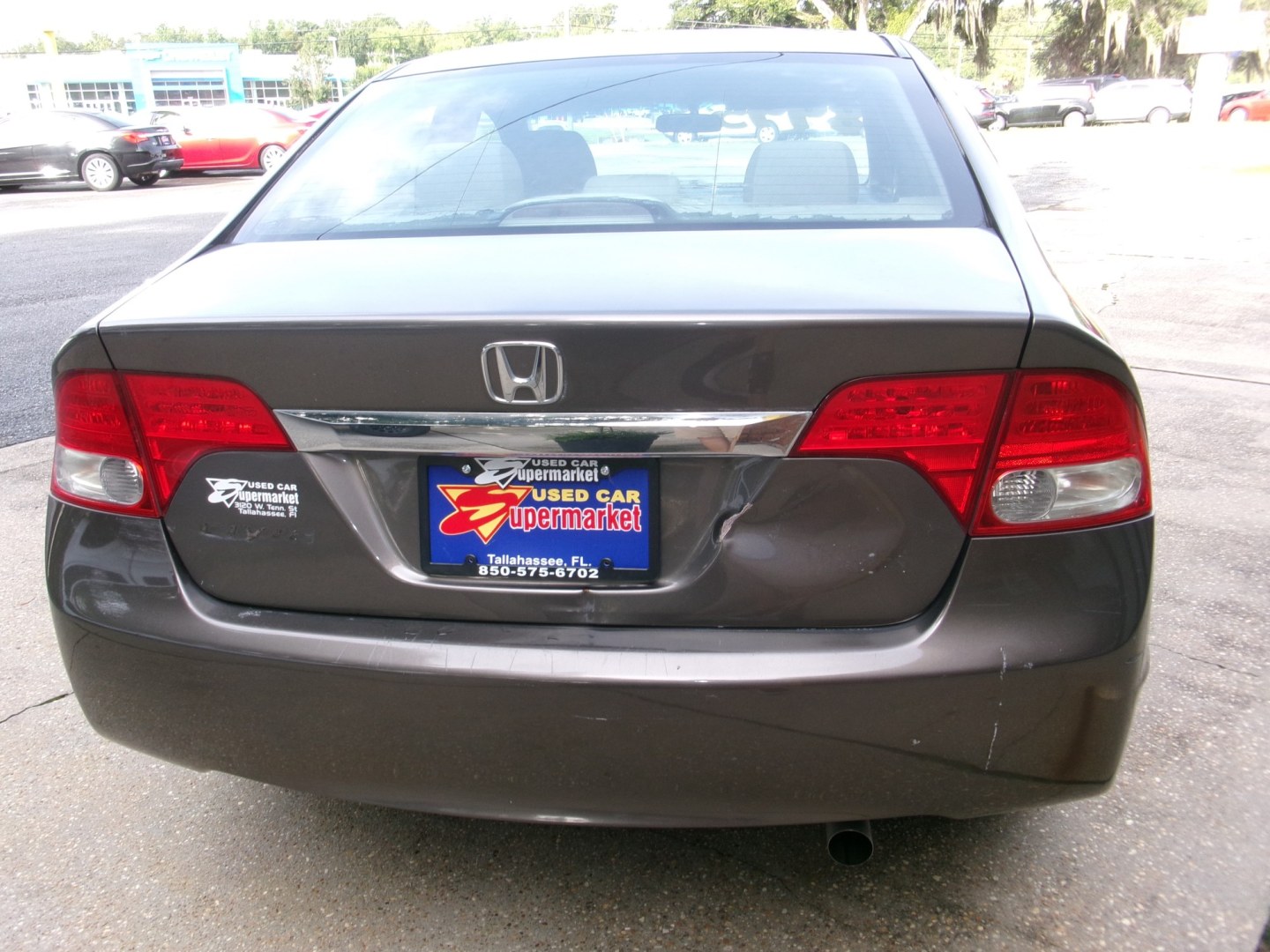 2010 Charcoal /Gray Honda Civic EX Sedan (19XFA1F86AE) with an 1.8L L4 SOHC 16V engine, Automatic transmission, located at 3120 W Tennessee St, Tallahassee, FL, 32304-1002, (850) 575-6702, 30.458841, -84.349648 - Used Car Supermarket is proud to present you with this loaded immaculate 2010 Honda Civic Sedan EX with low miles. Used Car Supermarket prides itself in offering you the finest pre-owned vehicle in Tallahassee. Used Car Supermarket has been locally family owned and operated for over 50 years. Our Ci- Photo#4