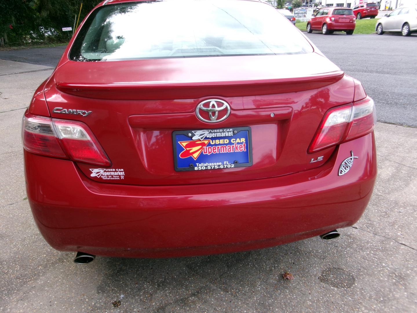 2007 Red /Tan Toyota Camry LE V6 (4T1BK46K17U) with an 3.5L V6 DOHC 24V engine, Automatic transmission, located at 3120 W Tennessee St, Tallahassee, FL, 32304-1002, (850) 575-6702, 30.458841, -84.349648 - Used Car Supermarket is proud to present you with this loaded immaculate 2007 Toyota Camry LE V6 with low miles. Used Car Supermarket prides itself in offering you the finest pre-owned vehicle in Tallahassee. Used Car Supermarket has been locally family owned and operated for over 50 years. Our Camr- Photo#3