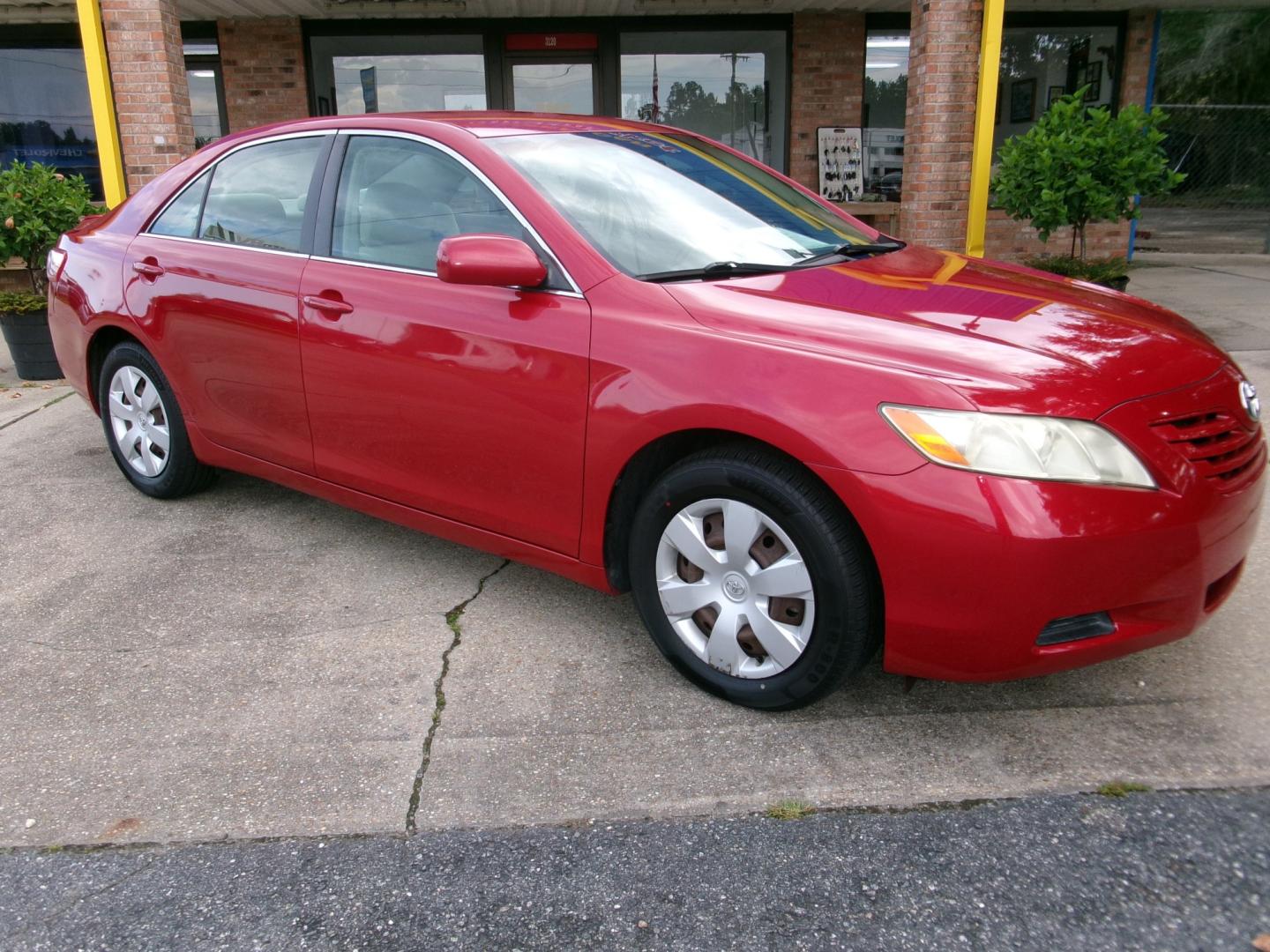 2007 Red /Tan Toyota Camry LE V6 (4T1BK46K17U) with an 3.5L V6 DOHC 24V engine, Automatic transmission, located at 3120 W Tennessee St, Tallahassee, FL, 32304-1002, (850) 575-6702, 30.458841, -84.349648 - Used Car Supermarket is proud to present you with this loaded immaculate 2007 Toyota Camry LE V6 with low miles. Used Car Supermarket prides itself in offering you the finest pre-owned vehicle in Tallahassee. Used Car Supermarket has been locally family owned and operated for over 50 years. Our Camr- Photo#0