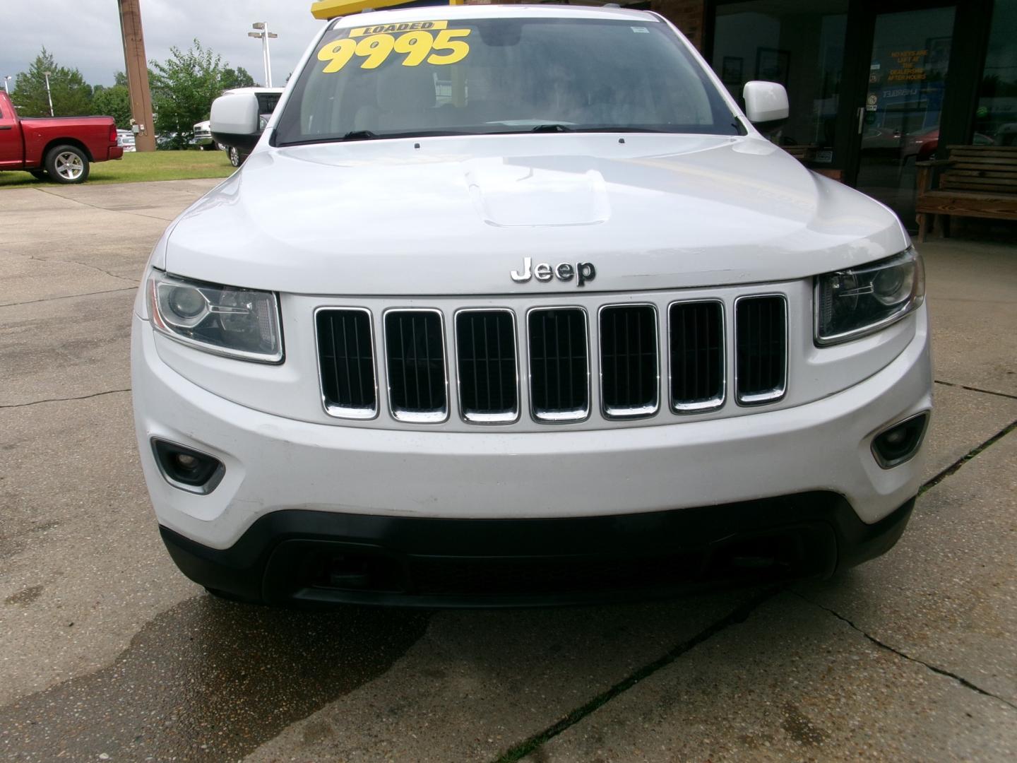 2014 White /Tan Jeep Grand Cherokee Laredo 4WD (1C4RJFAG6EC) with an 3.6L V6 DOHC 24V engine, Automatic transmission, located at 3120 W Tennessee St, Tallahassee, FL, 32304-1002, (850) 575-6702, 30.458841, -84.349648- Photo#0