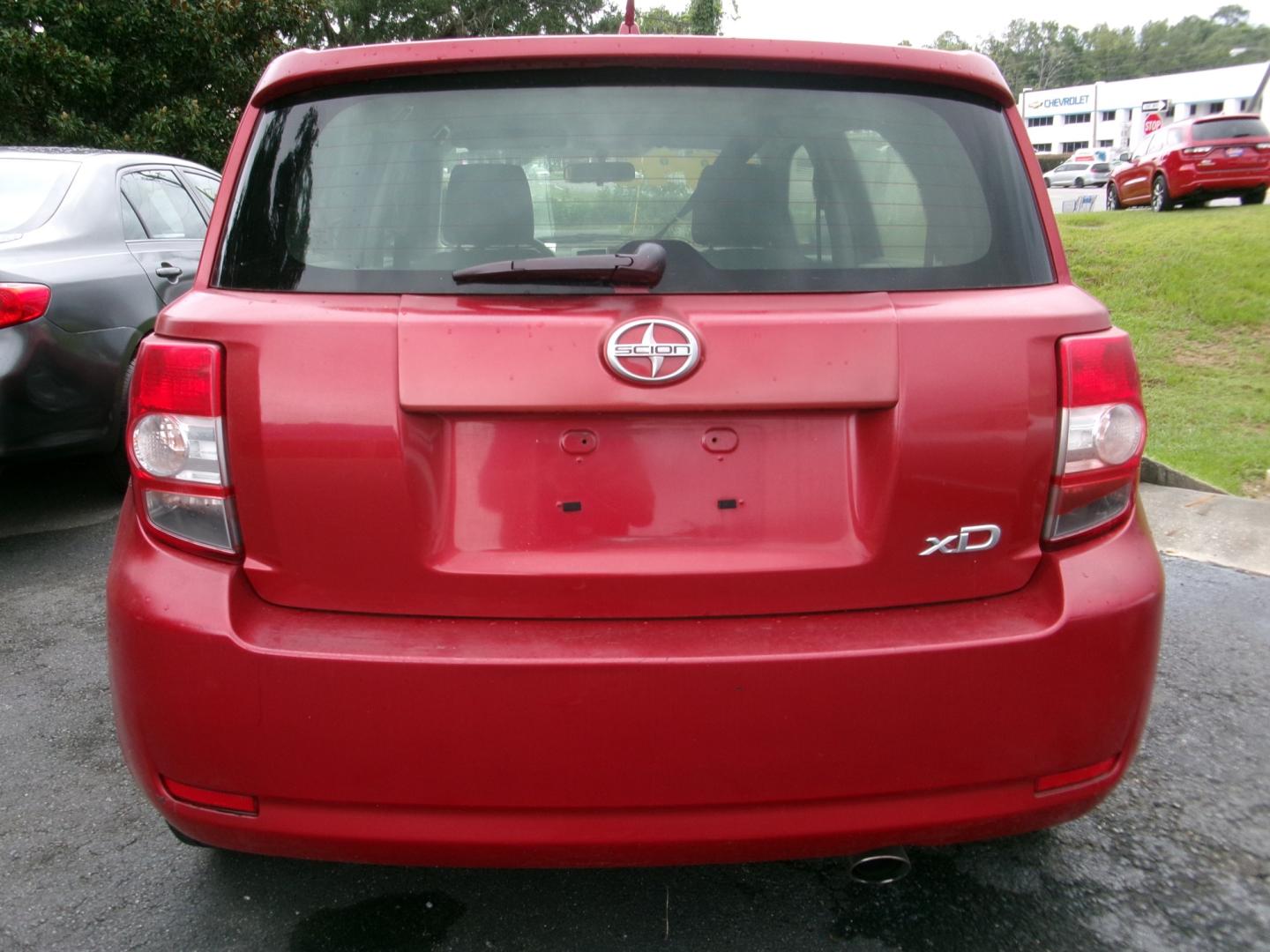 2010 Red /Charcoal Scion xD 5-Door (JTKKU4B46A1) with an 1.8L L4 DOHC16V engine, Automatic transmission, located at 3120 W Tennessee St, Tallahassee, FL, 32304-1002, (850) 575-6702, 30.458841, -84.349648 - Used Car Supermarket is proud to present you with this loaded immaculate 2010 Scion XD. Used Car Supermarket prides itself in offering you the finest pre-owned vehicle in Tallahassee. Used Car Supermarket has been locally family owned and operated for over 50 years. Our Scion XD has been serviced an- Photo#4